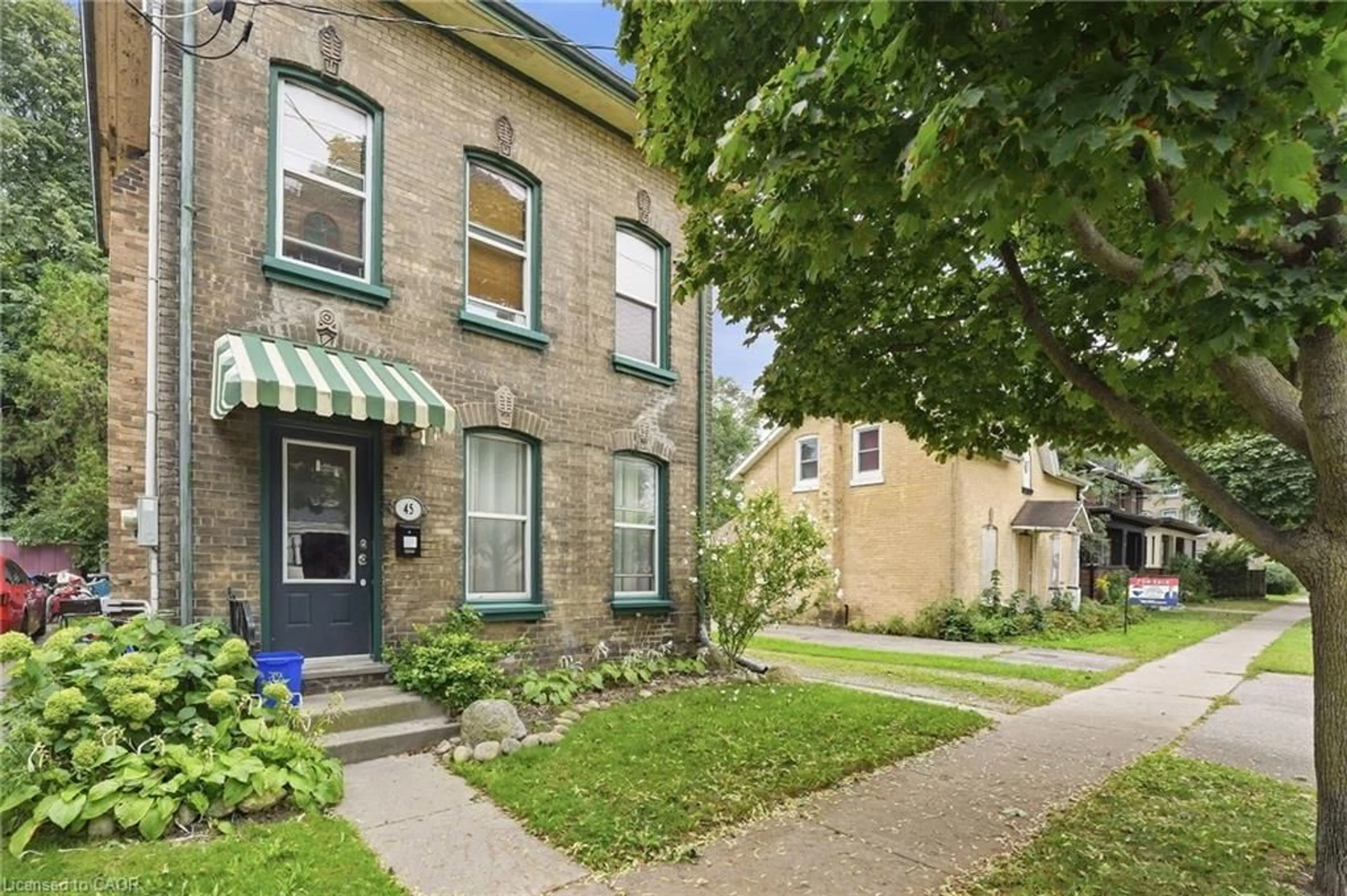 Home with brick exterior material, street for 45 East Ave, Brantford Ontario N3S 3L2