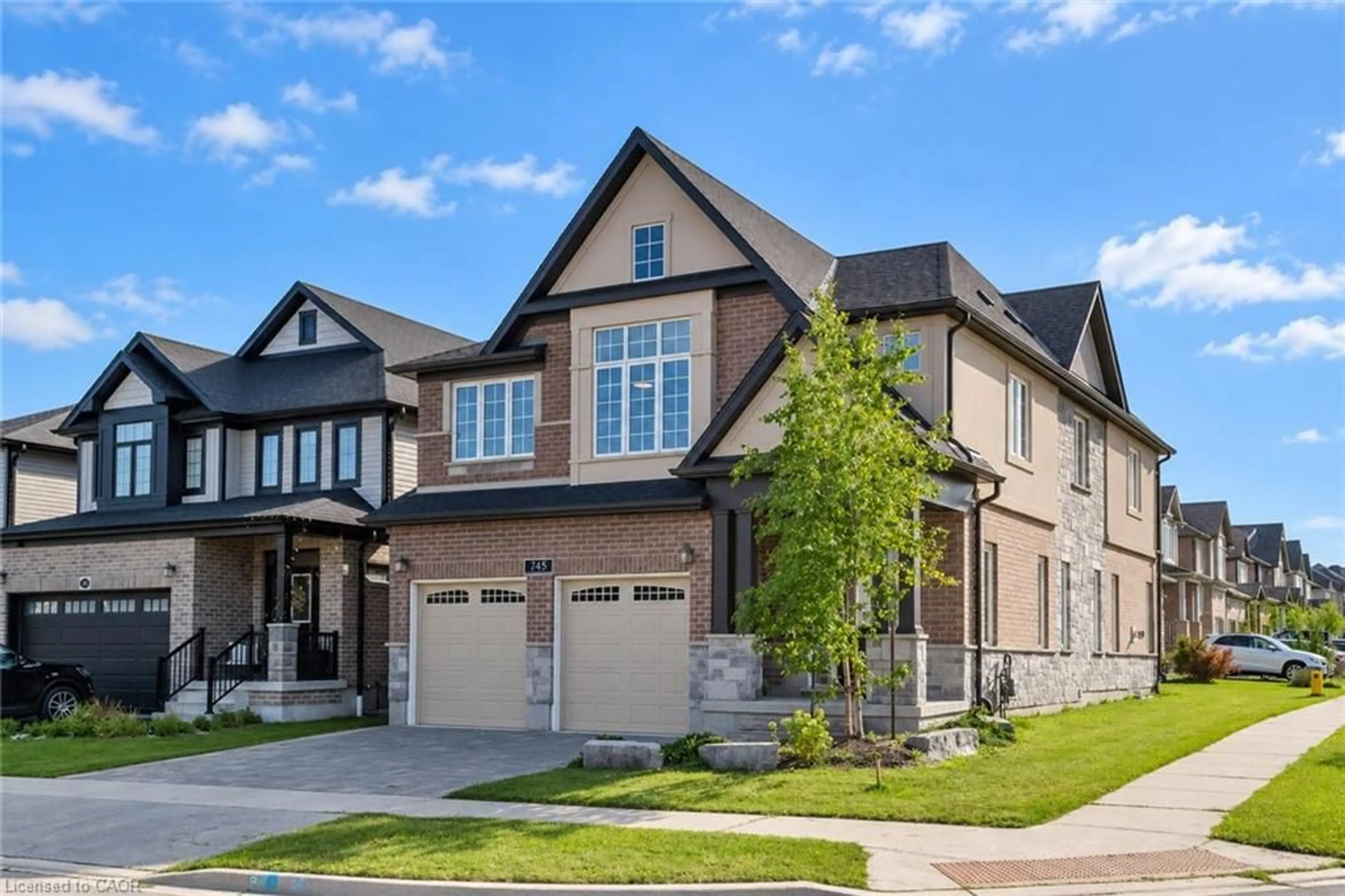 Home with brick exterior material, street for 745 Wood Lily St, Waterloo Ontario N2V 0C3