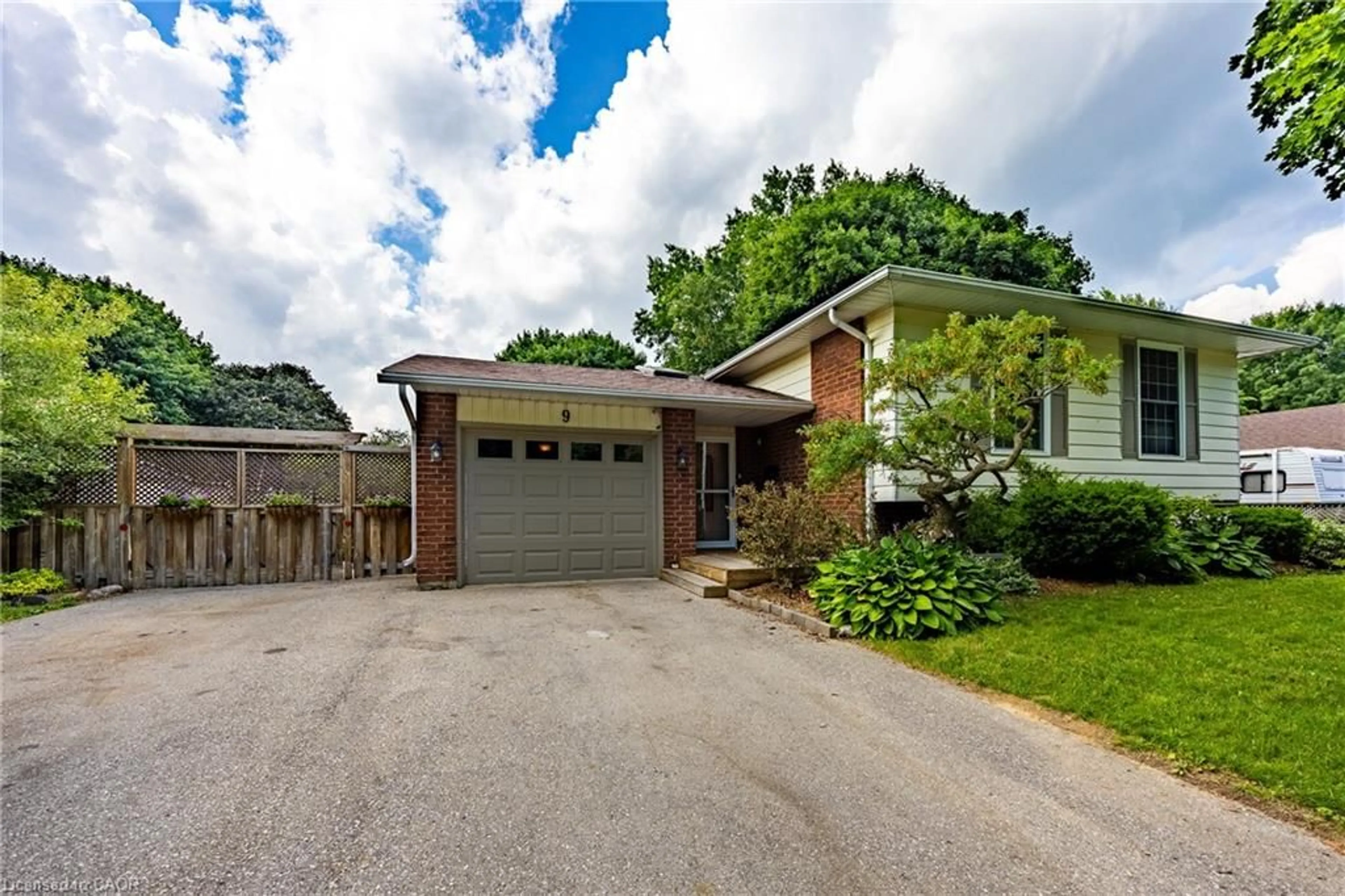 Home with brick exterior material, street for 9 Adams Lane, Simcoe Ontario N3Y 4P4