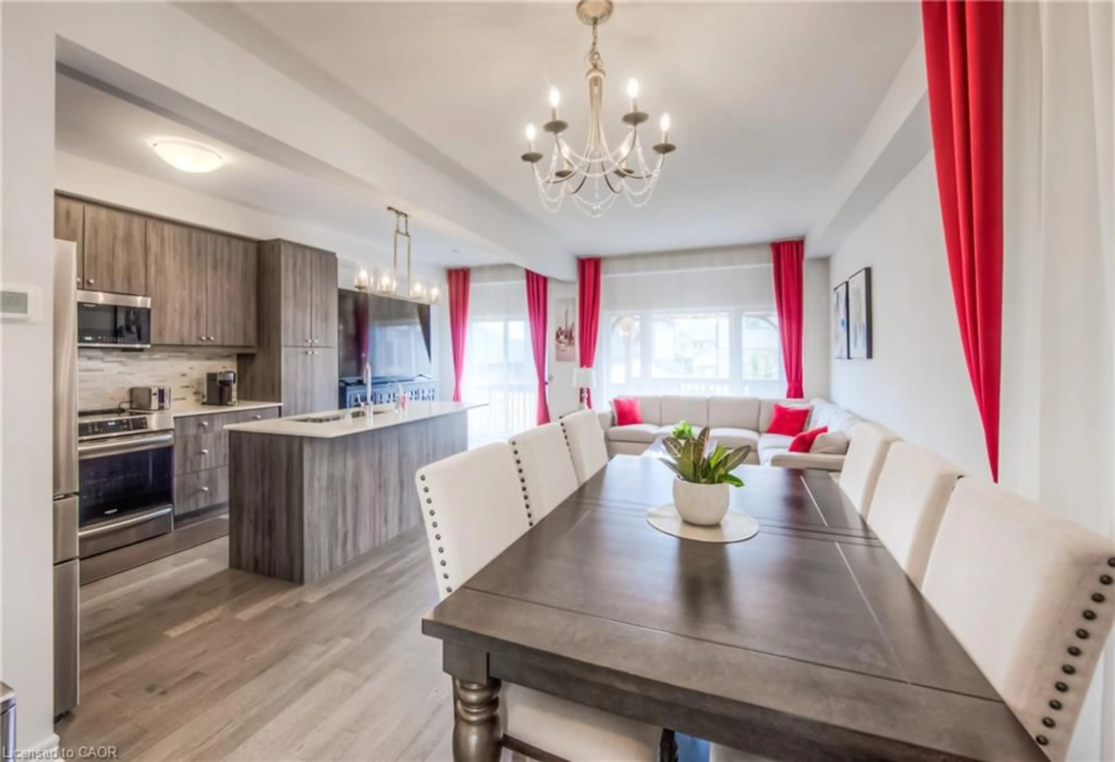 Open concept kitchen, wood/laminate floor for 19 Baker Lane, Paris Ontario N3L 0K3