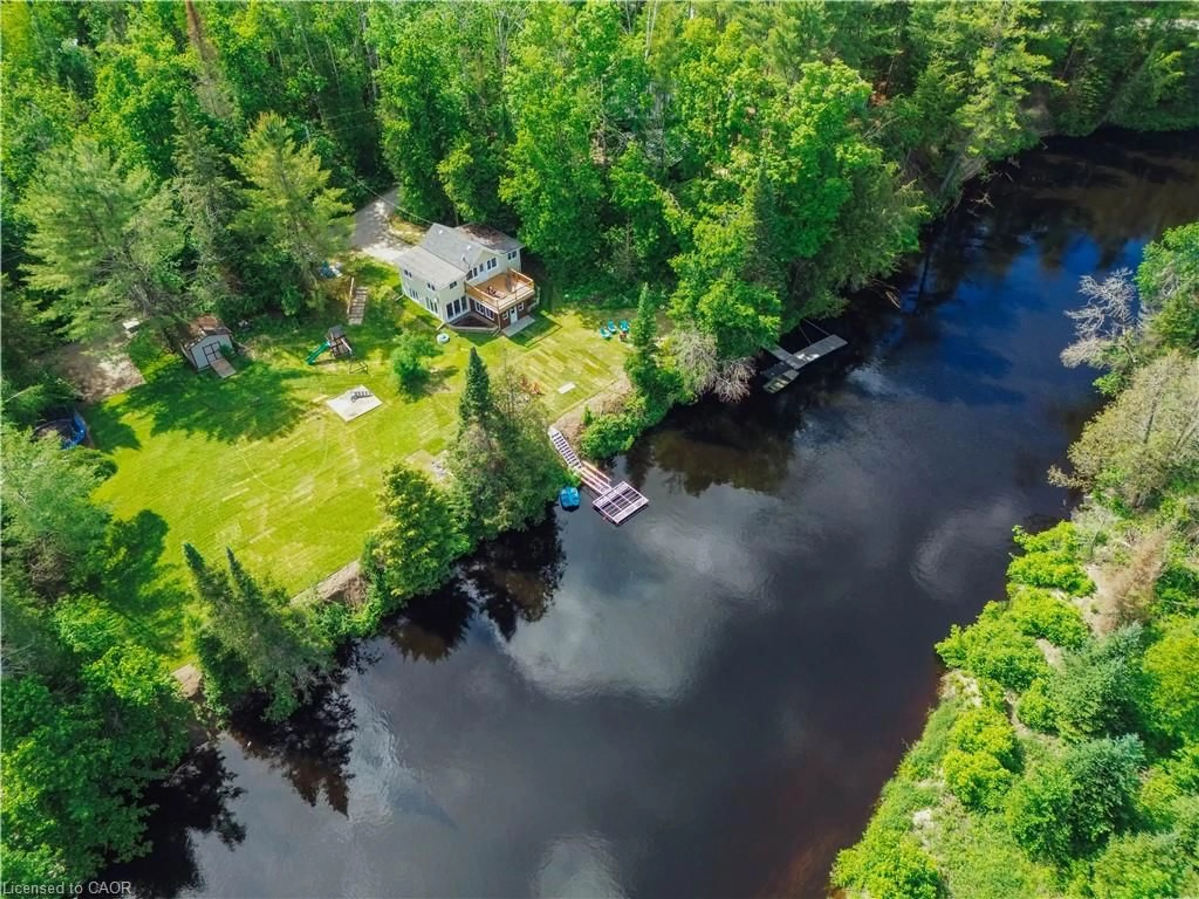 A pic from outside/outdoor area/front of a property/back of a property/a pic from drone, water/lake/river/ocean view for 11 Side Rd, Kinmount Ontario K0M 1C0