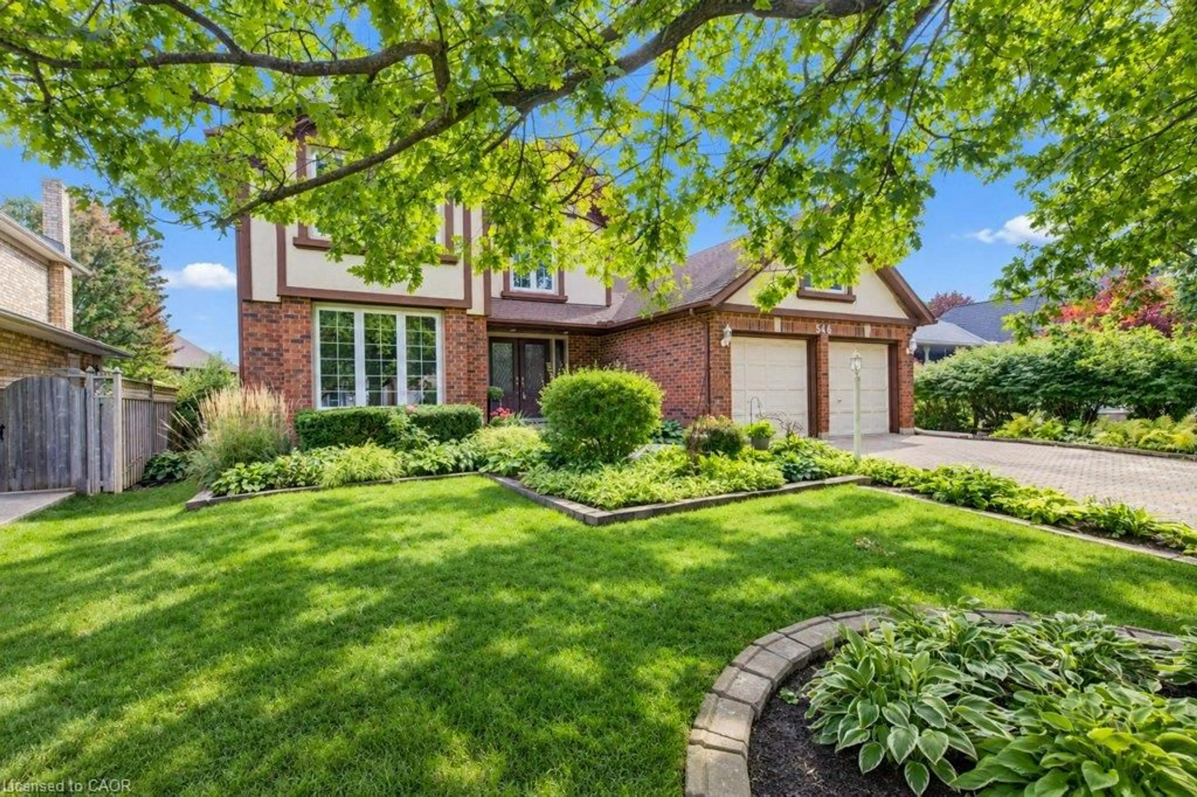Home with brick exterior material, street for 546 Sandbrooke Crt, Waterloo Ontario N2T 2H4