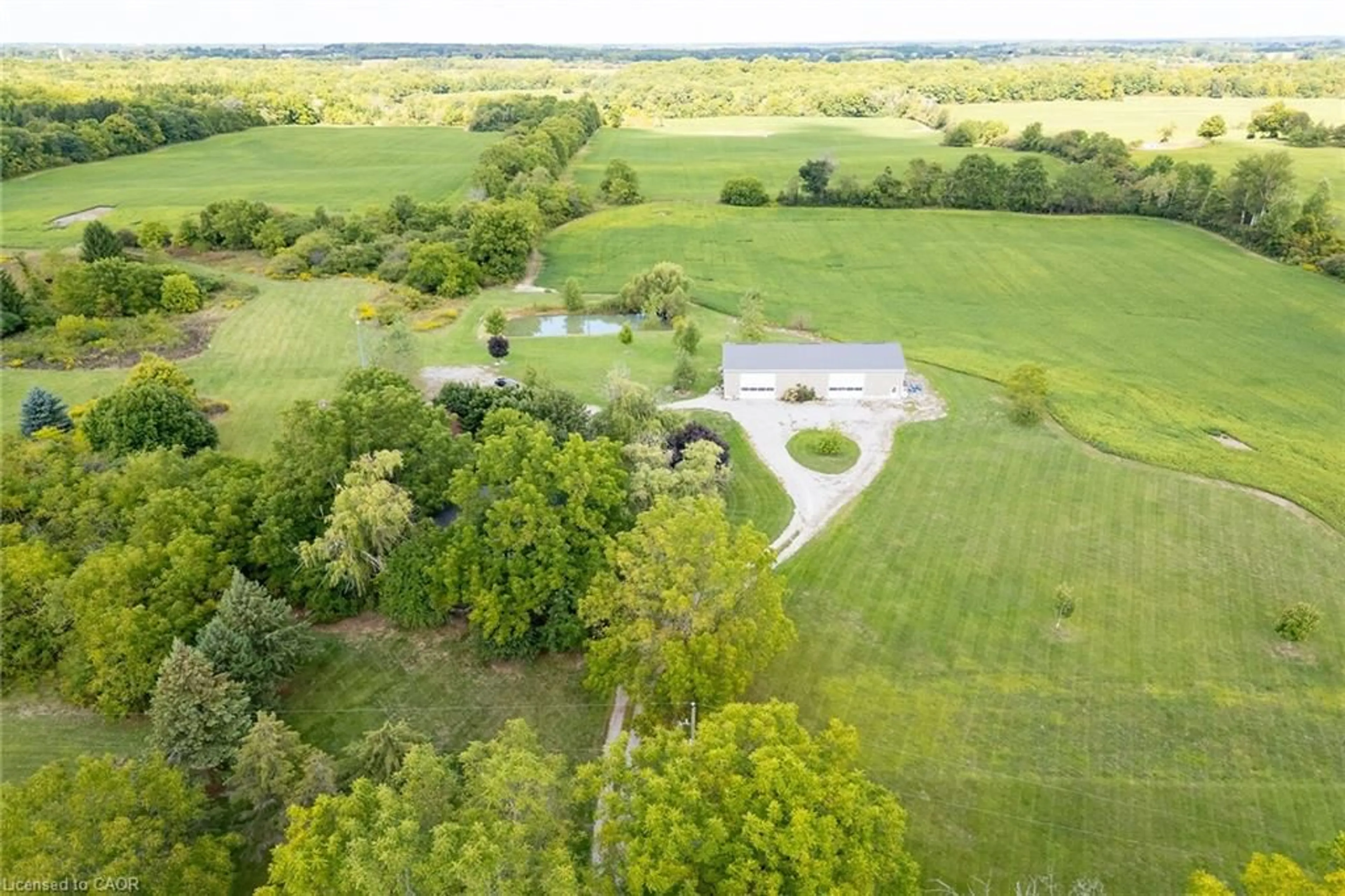 A pic from outside/outdoor area/front of a property/back of a property/a pic from drone, water/lake/river/ocean view for 655 Townline Rd, Cayuga Ontario N0A 1E0
