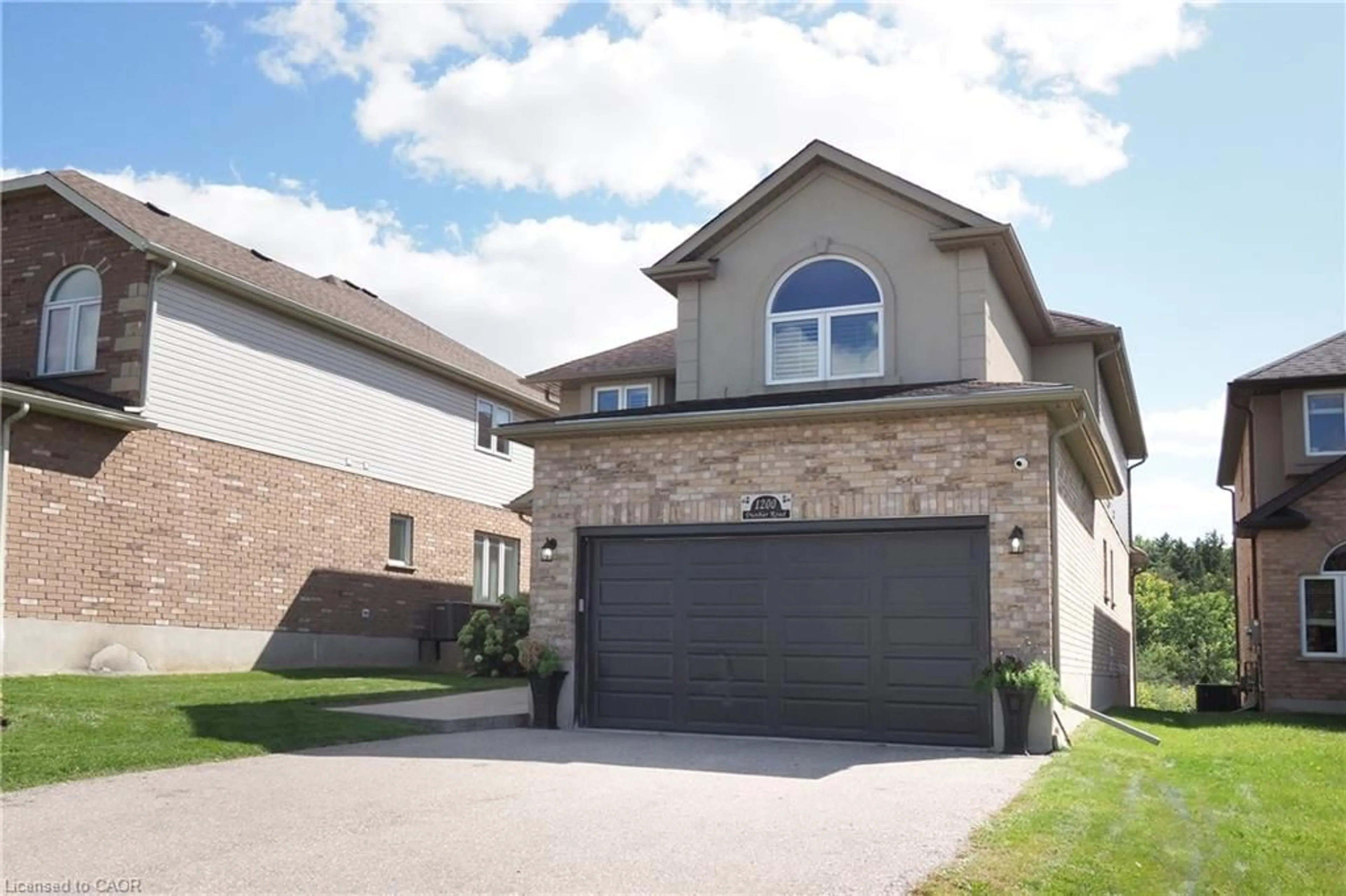 Home with brick exterior material, street for 1200 Dunbar Rd, Cambridge Ontario N3H 4W6