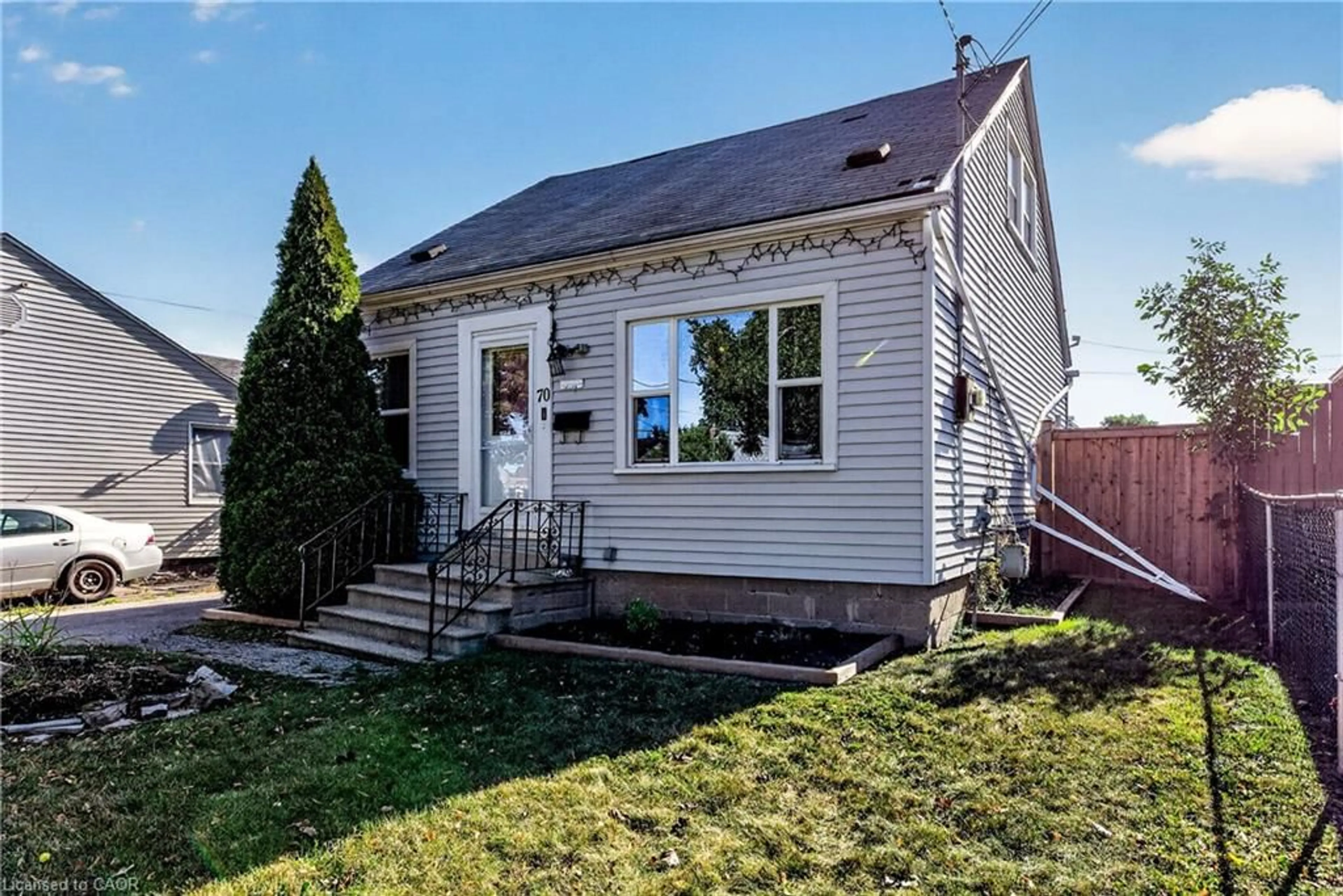 Home with vinyl exterior material, street for 70 Glennie Ave, Hamilton Ontario L8H 5V9