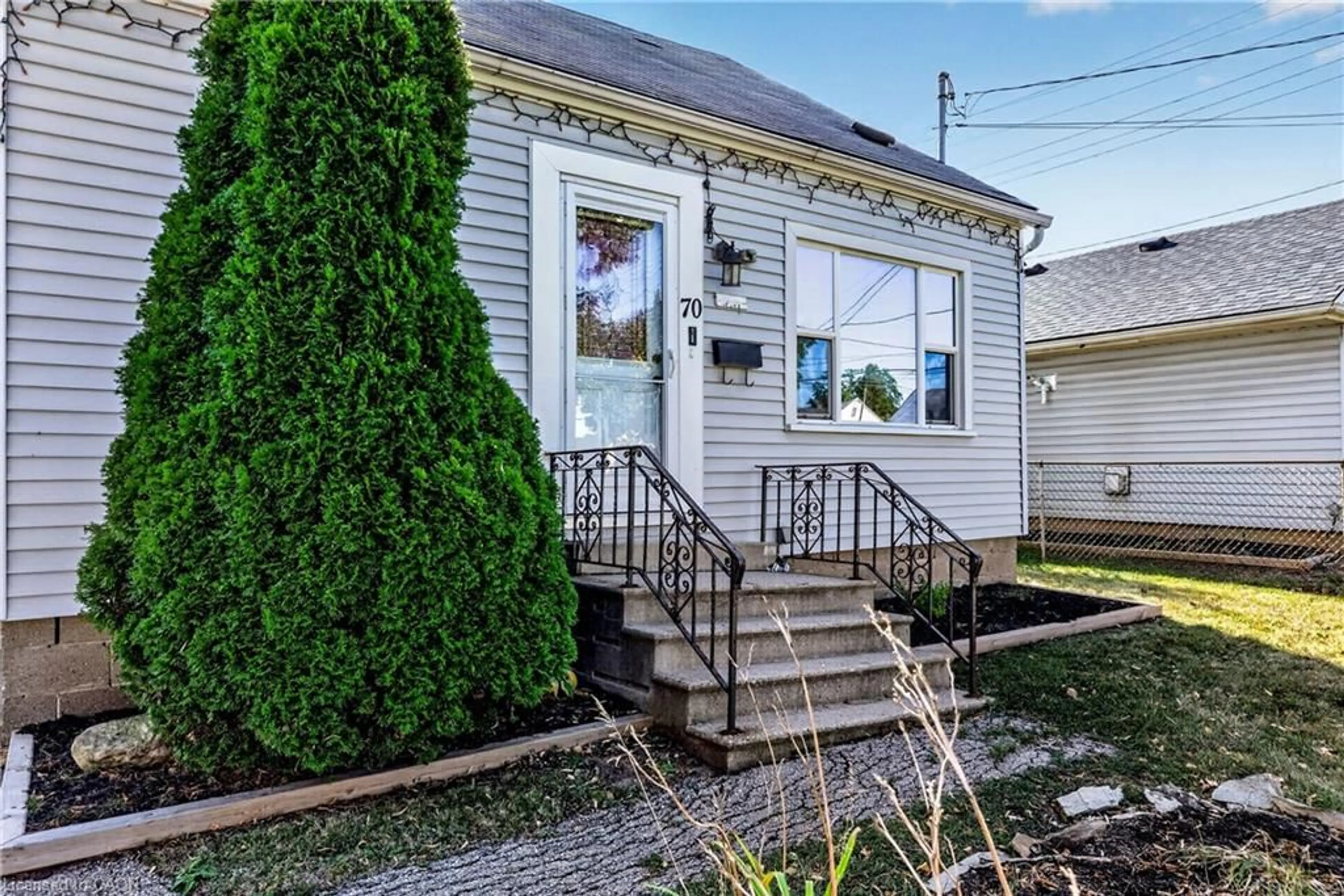 Home with vinyl exterior material, street for 70 Glennie Ave, Hamilton Ontario L8H 5V9