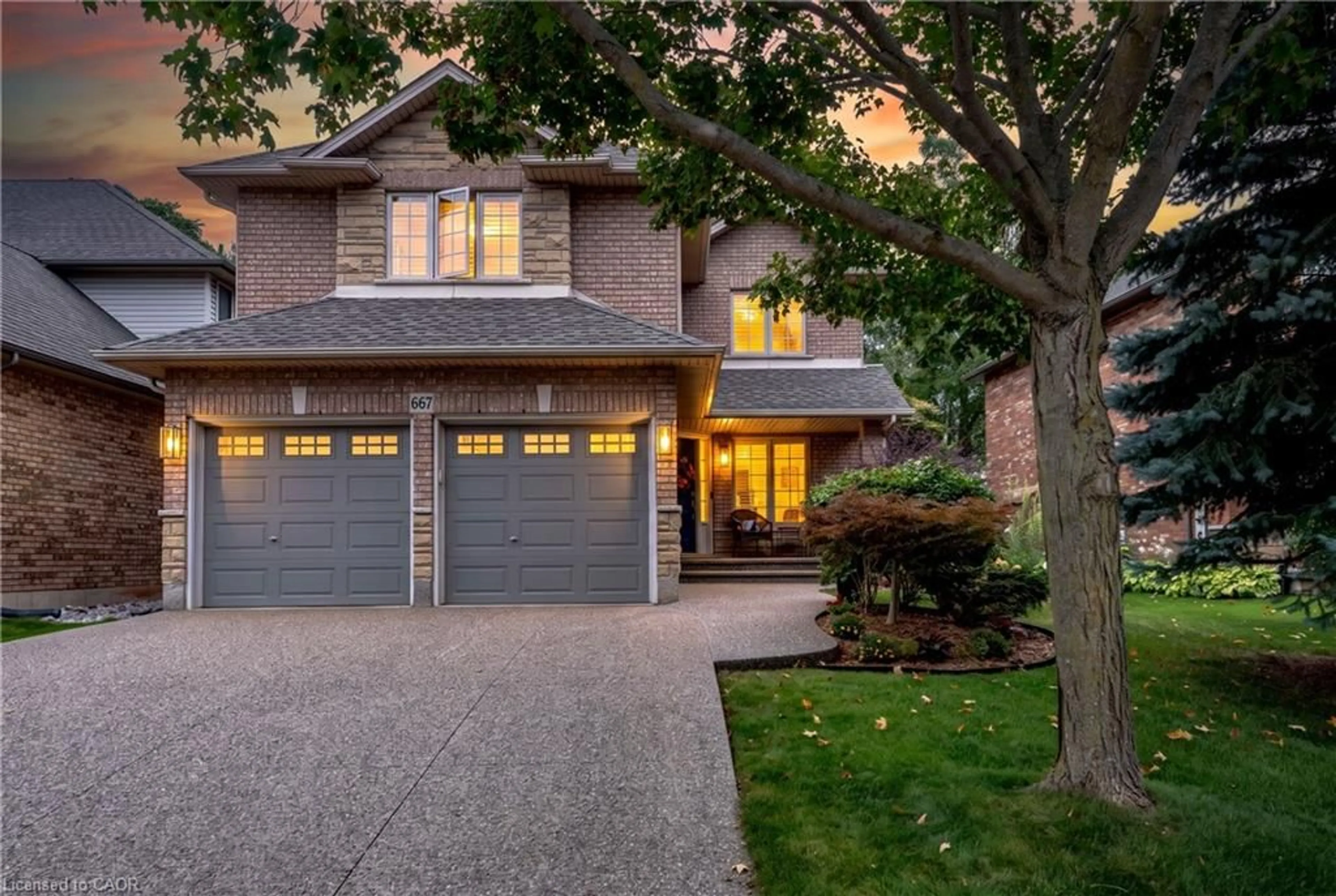 Home with brick exterior material, street for 667 Sandcherry Dr, Burlington Ontario L7T 4L4