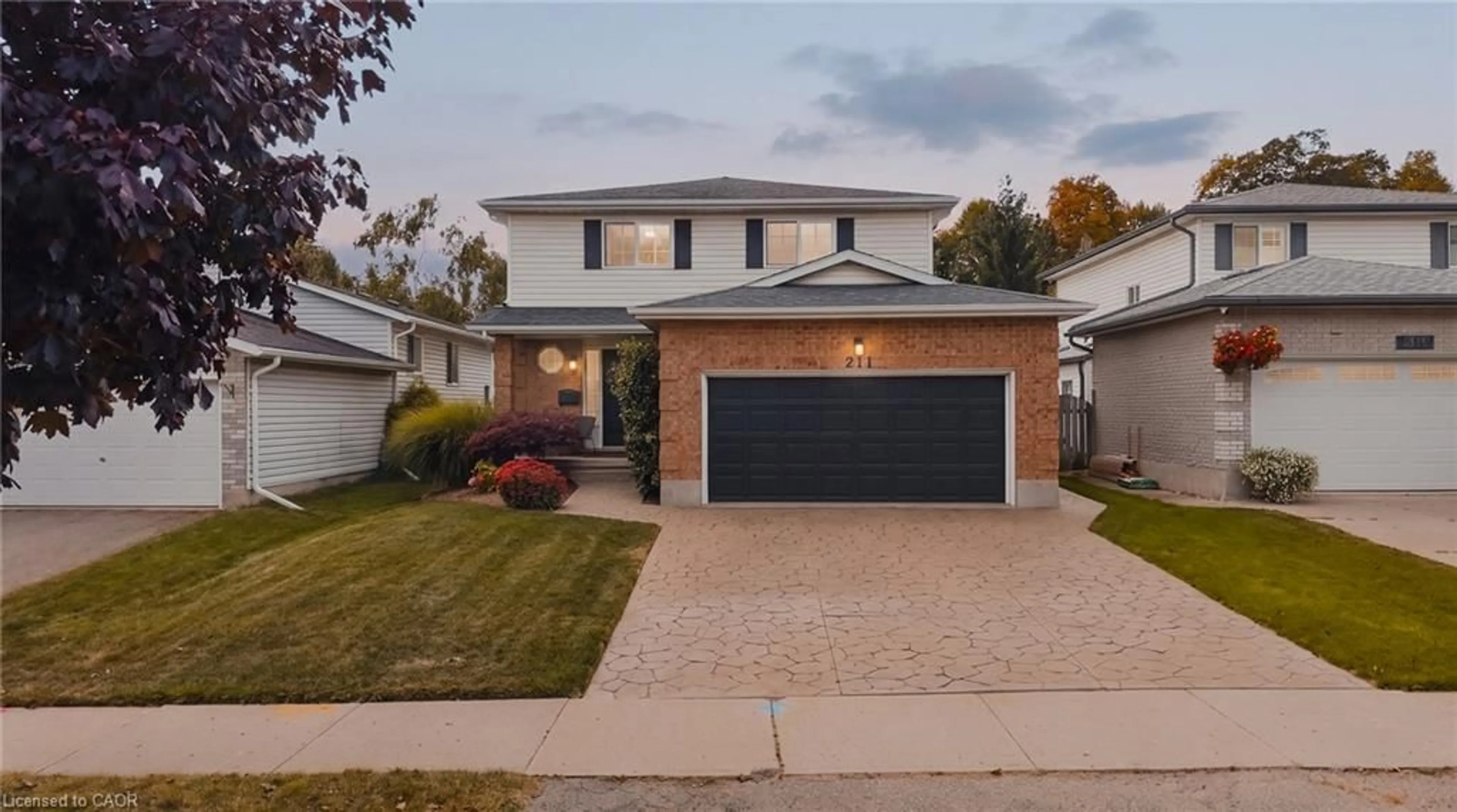 Home with brick exterior material, street for 211 Eastforest Trail, Kitchener Ontario N2N 3E8