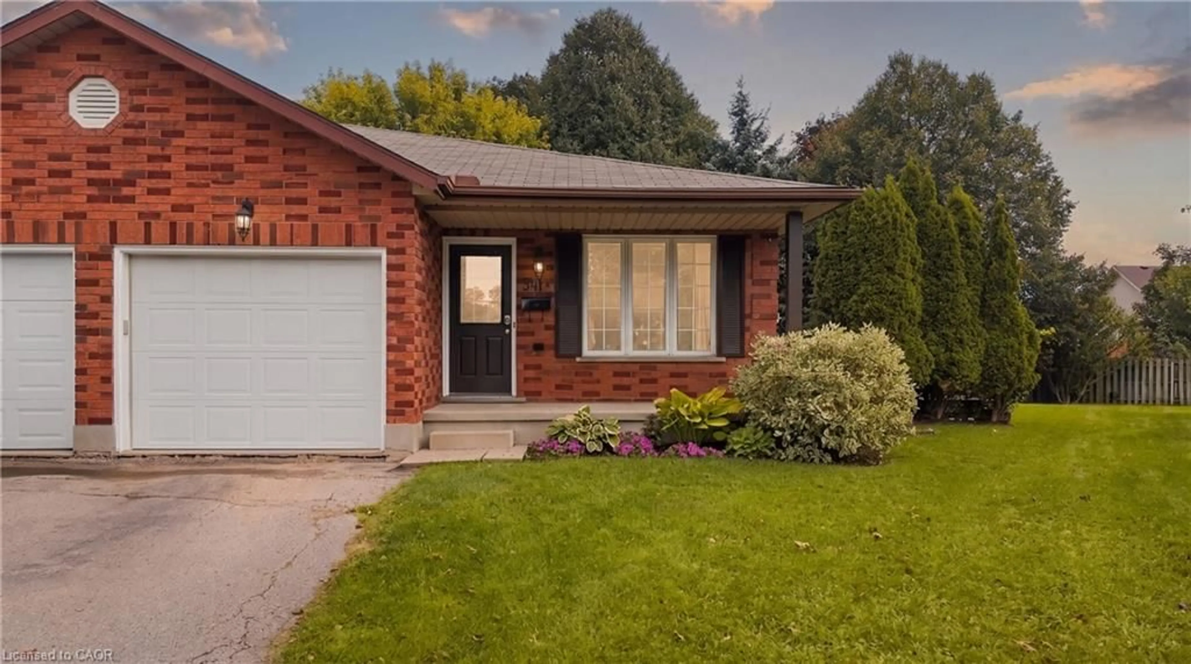 Home with brick exterior material, street for 541 Old Abbey Crt #B, Waterloo Ontario N2K 3V3