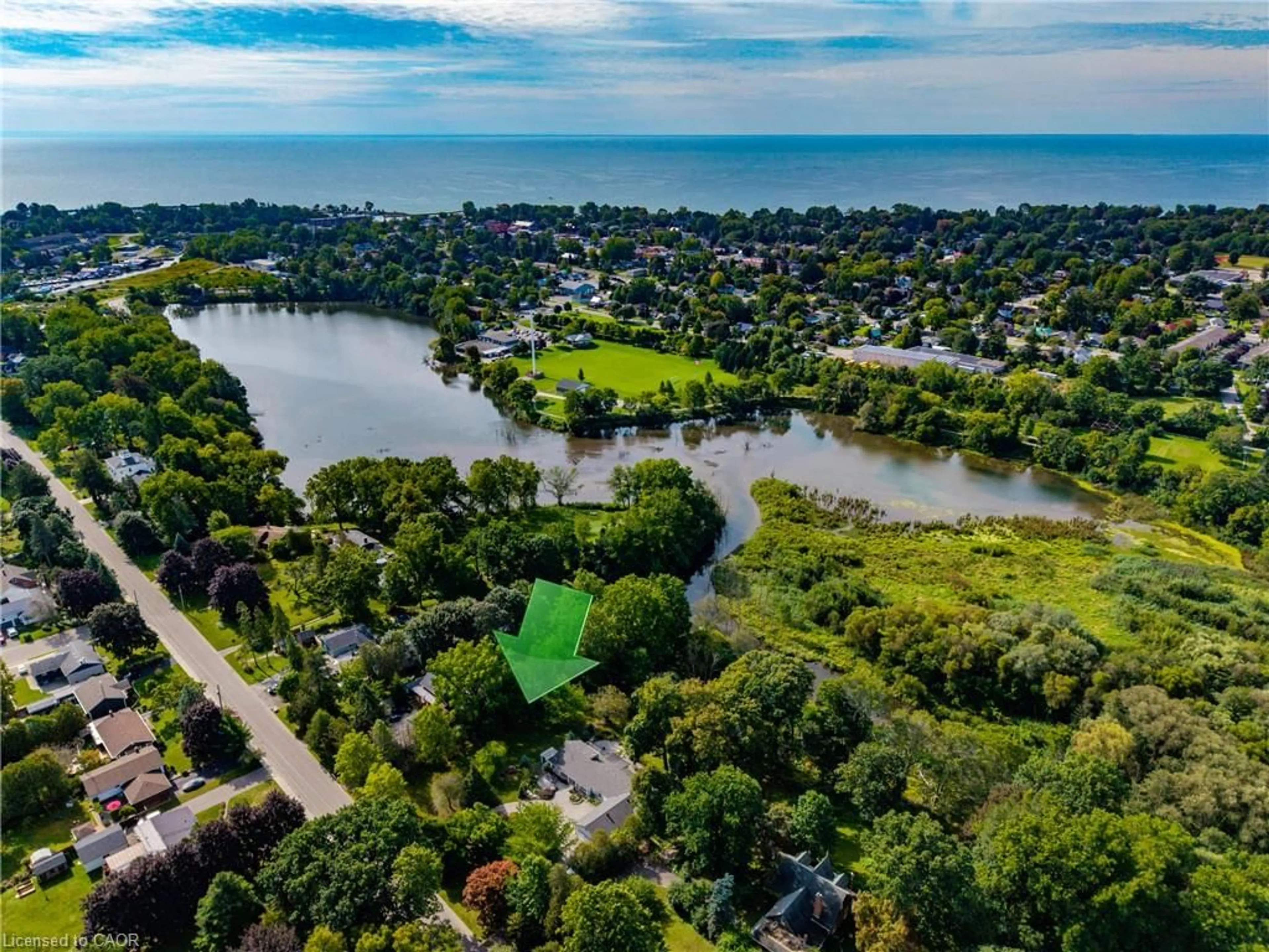 A pic from outside/outdoor area/front of a property/back of a property/a pic from drone, water/lake/river/ocean view for 73 & 75 Prospect St, Port Dover Ontario N0A 1N6