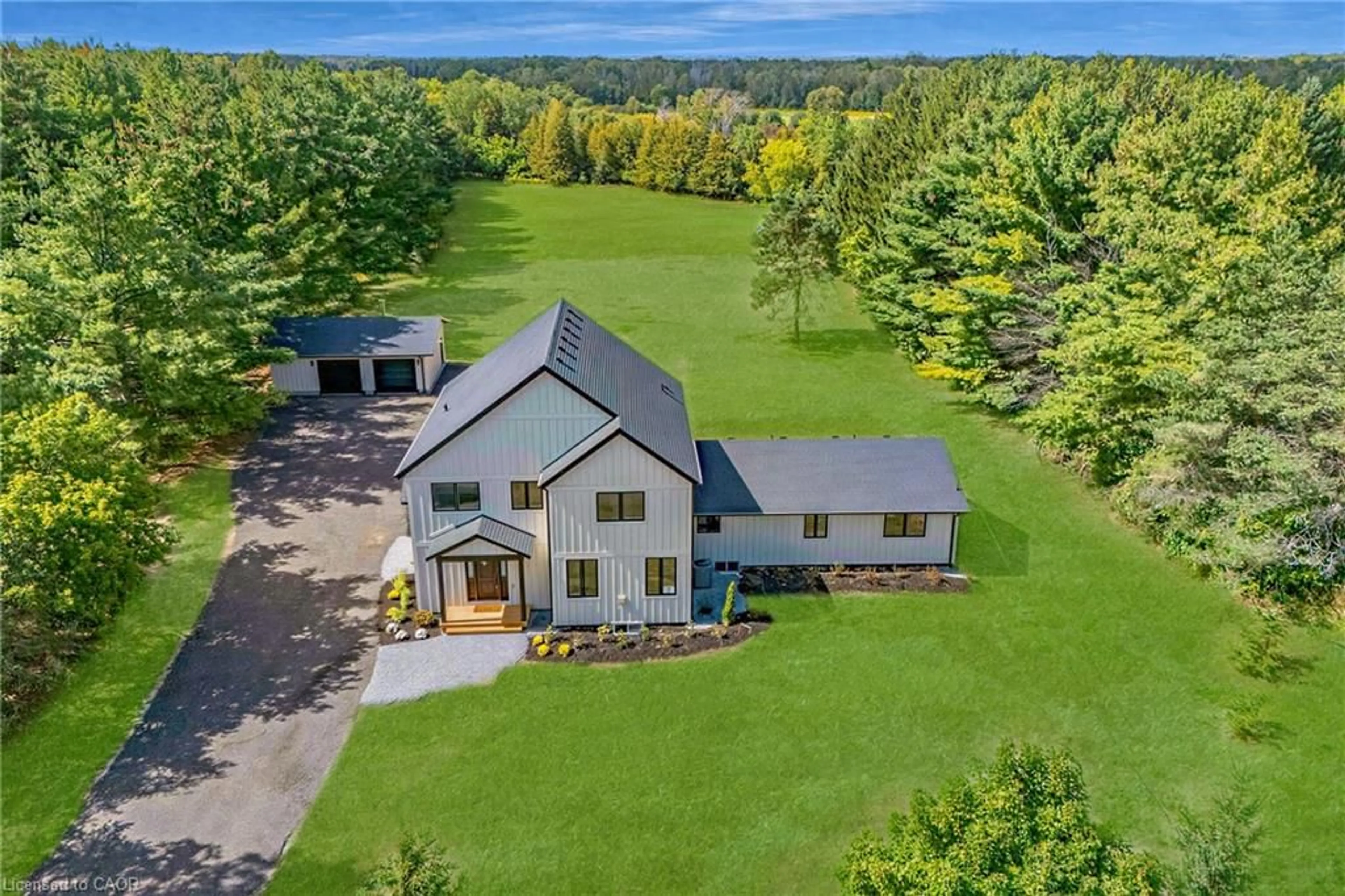 A pic from outside/outdoor area/front of a property/back of a property/a pic from drone, unknown for 21674 Highway 48, East Gwillimbury Ontario L0G 1M0