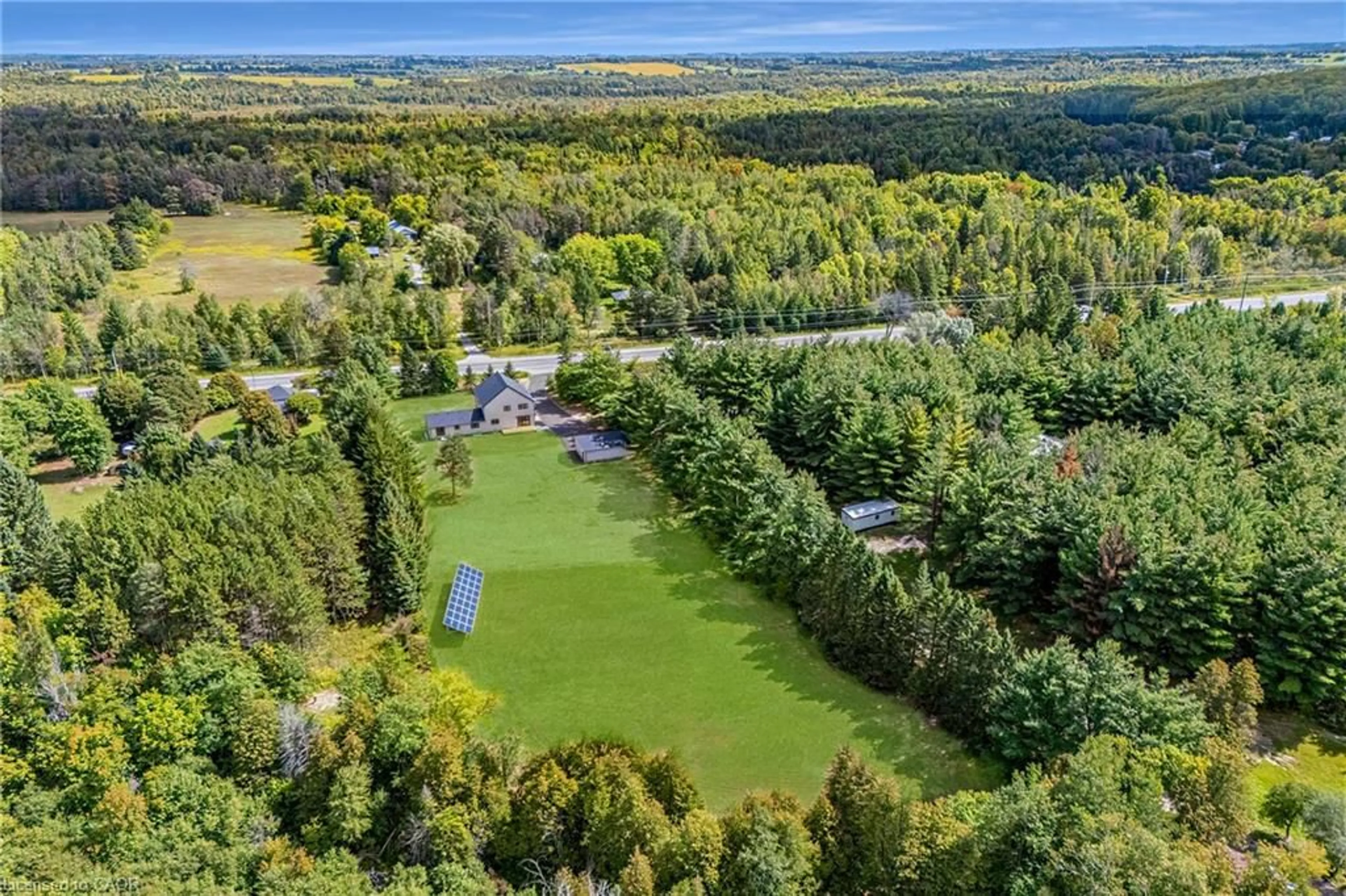 A pic from outside/outdoor area/front of a property/back of a property/a pic from drone, forest/trees view for 21674 Highway 48, East Gwillimbury Ontario L0G 1M0