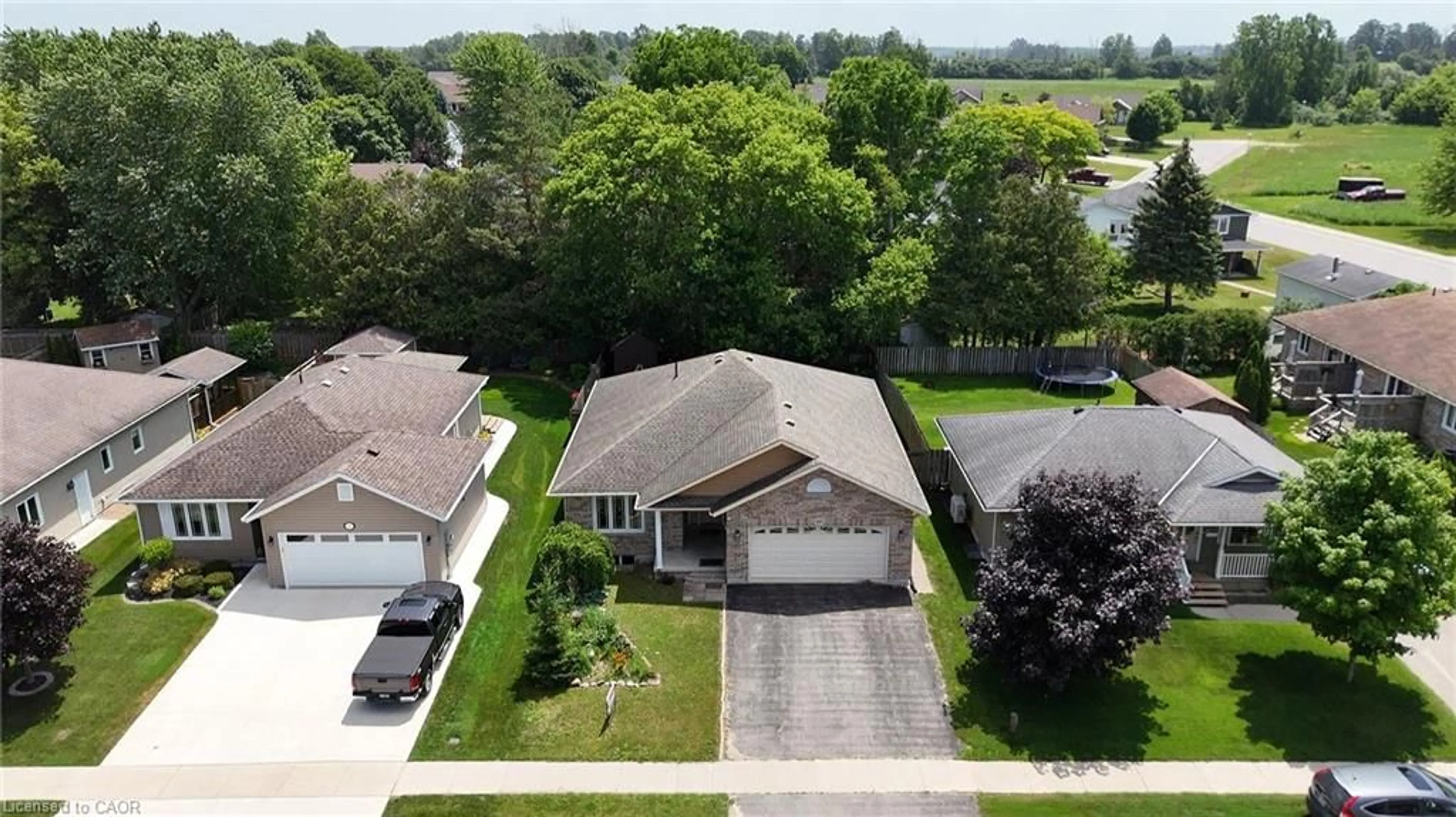 A pic from outside/outdoor area/front of a property/back of a property/a pic from drone, street for 401 Carling Terr, Wingham Ontario N0G 2W0