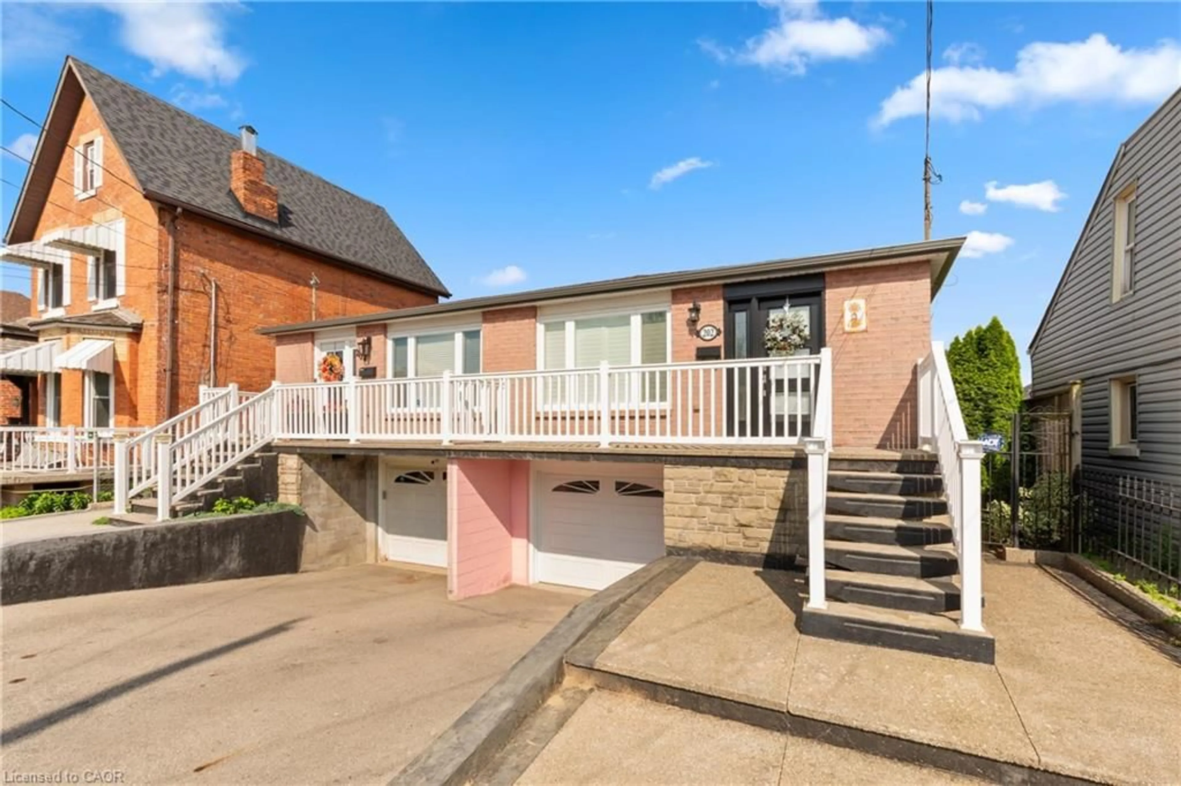 A pic from outside/outdoor area/front of a property/back of a property/a pic from drone, street for 202 Ray St, Hamilton Ontario L8R 2Y2