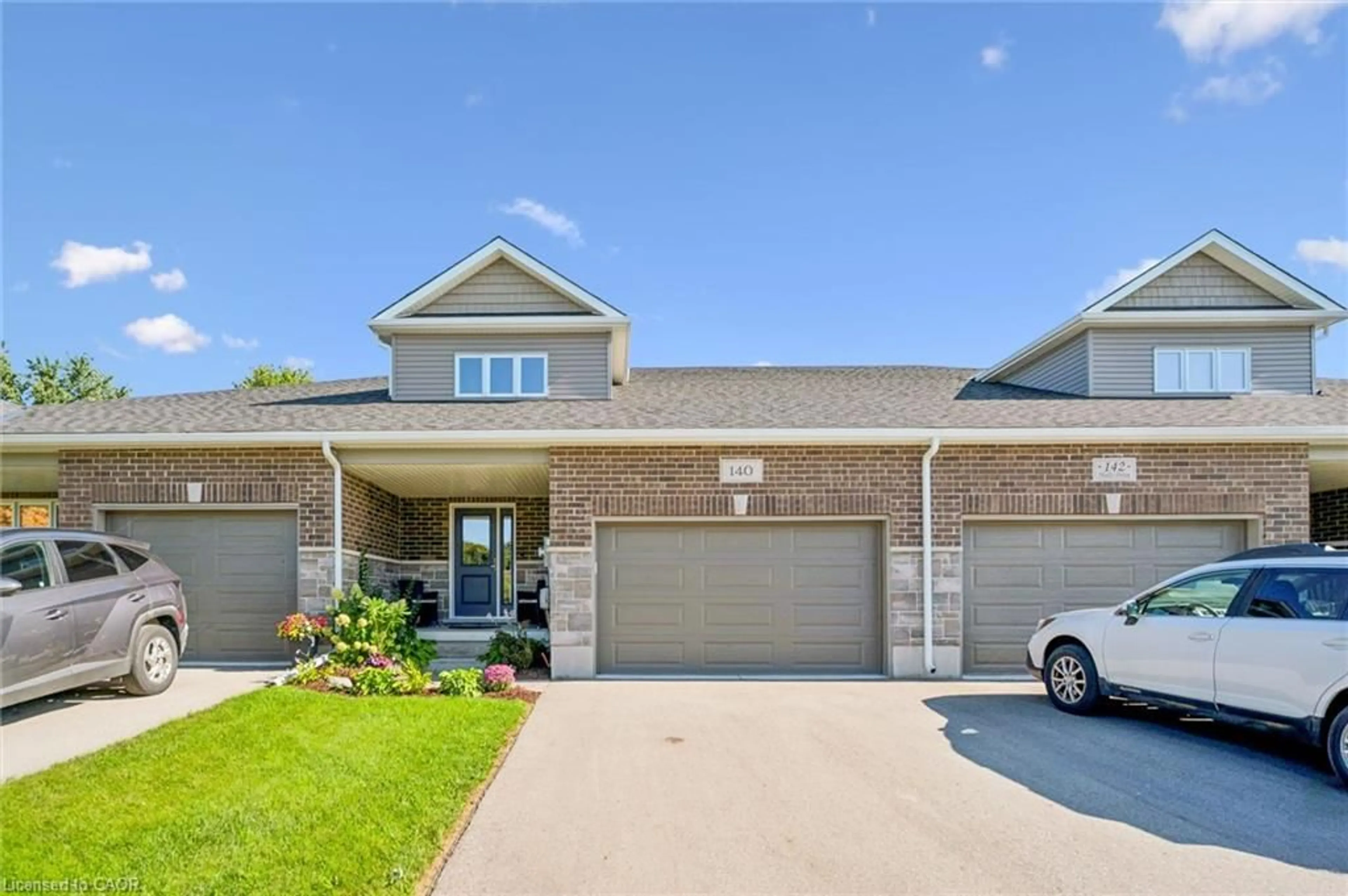 Home with brick exterior material, street for 140 Halls Dr, Elora Ontario N0B 1S0