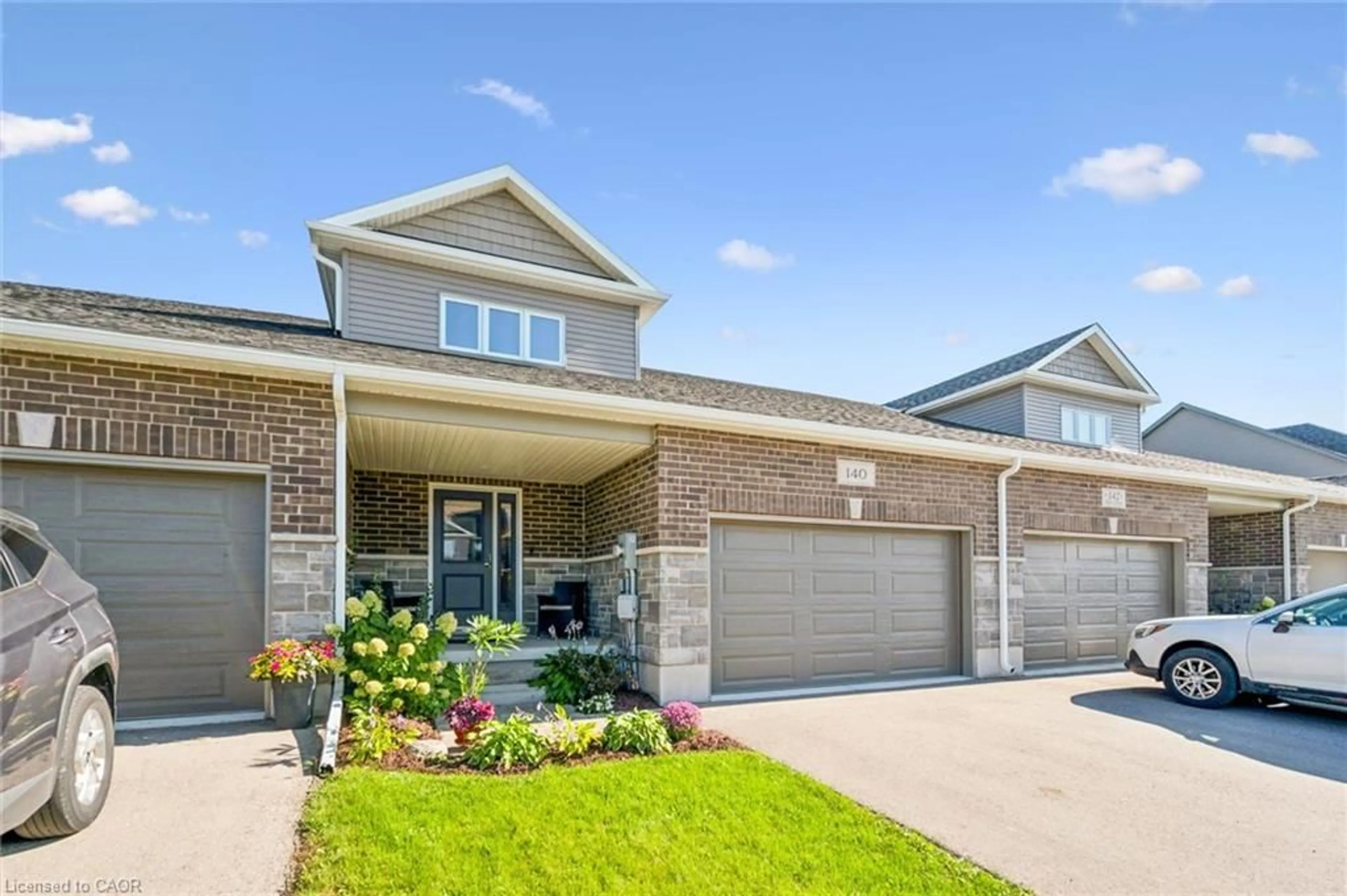 Home with brick exterior material, street for 140 Halls Dr, Elora Ontario N0B 1S0