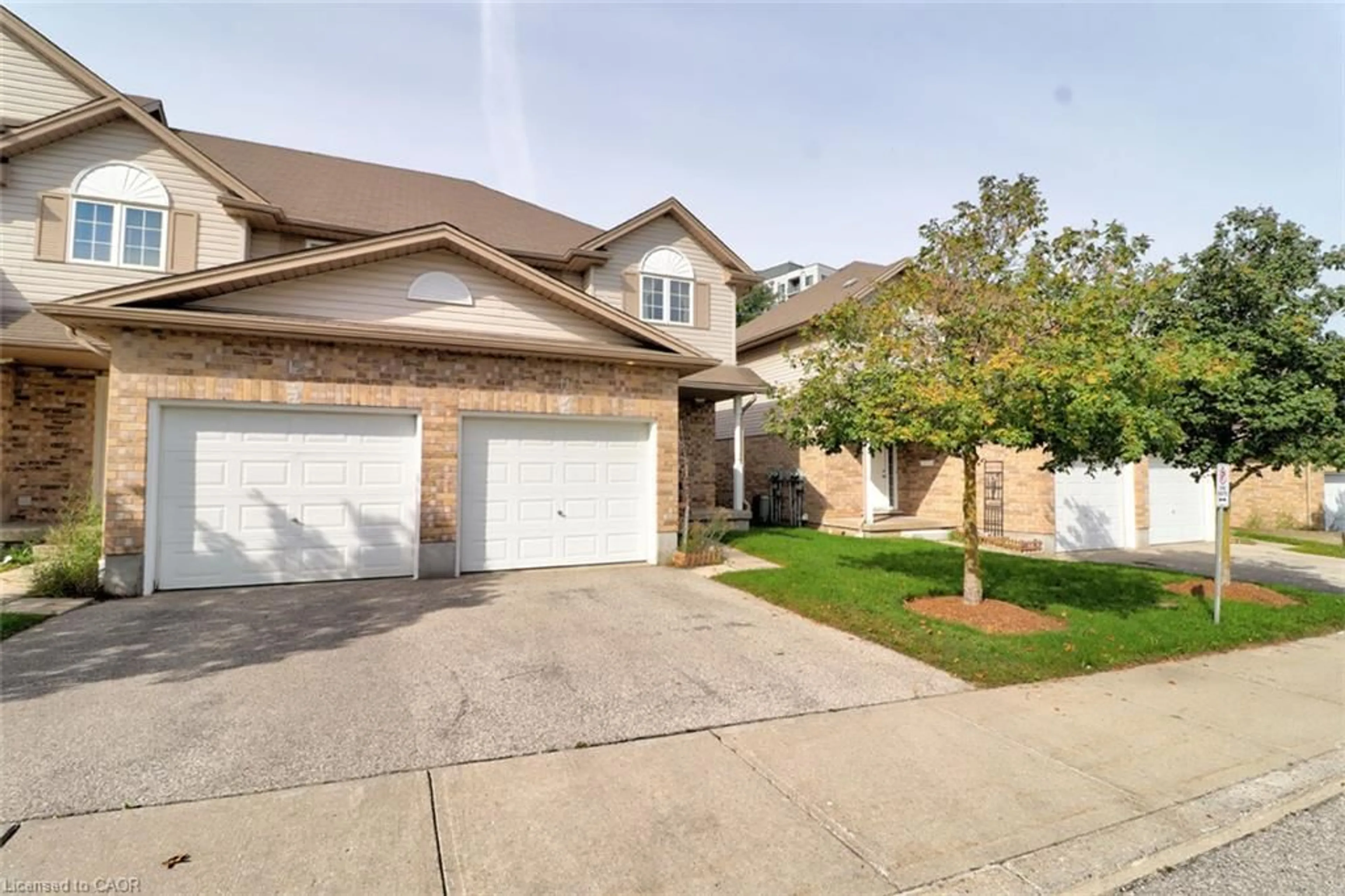 Home with brick exterior material, street for 10 Fallowfield Dr #11, Kitchener Ontario N2C 0A4