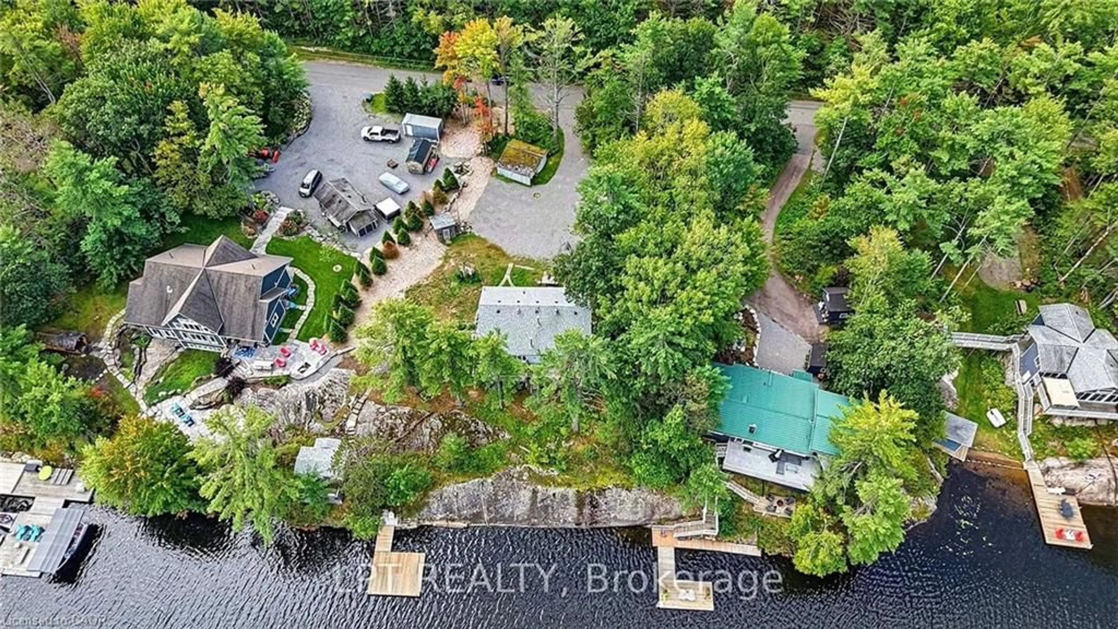 A pic from outside/outdoor area/front of a property/back of a property/a pic from drone, water/lake/river/ocean view for 5 Pinetree Rd S1 Rd, Gravenhurst Ontario P1P 0E2