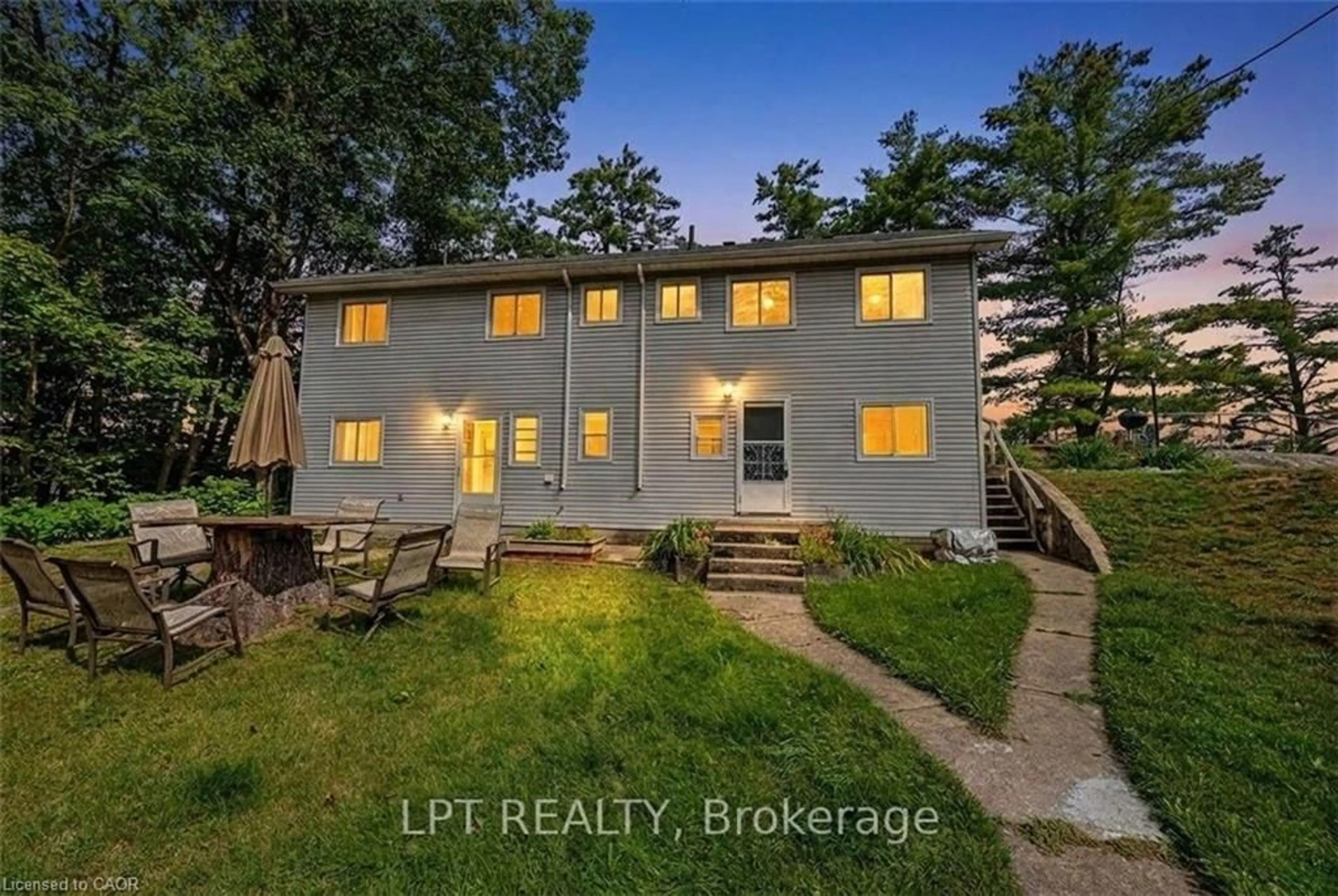 A pic from outside/outdoor area/front of a property/back of a property/a pic from drone, water/lake/river/ocean view for 5 Pinetree Rd S1 Rd, Gravenhurst Ontario P1P 0E2