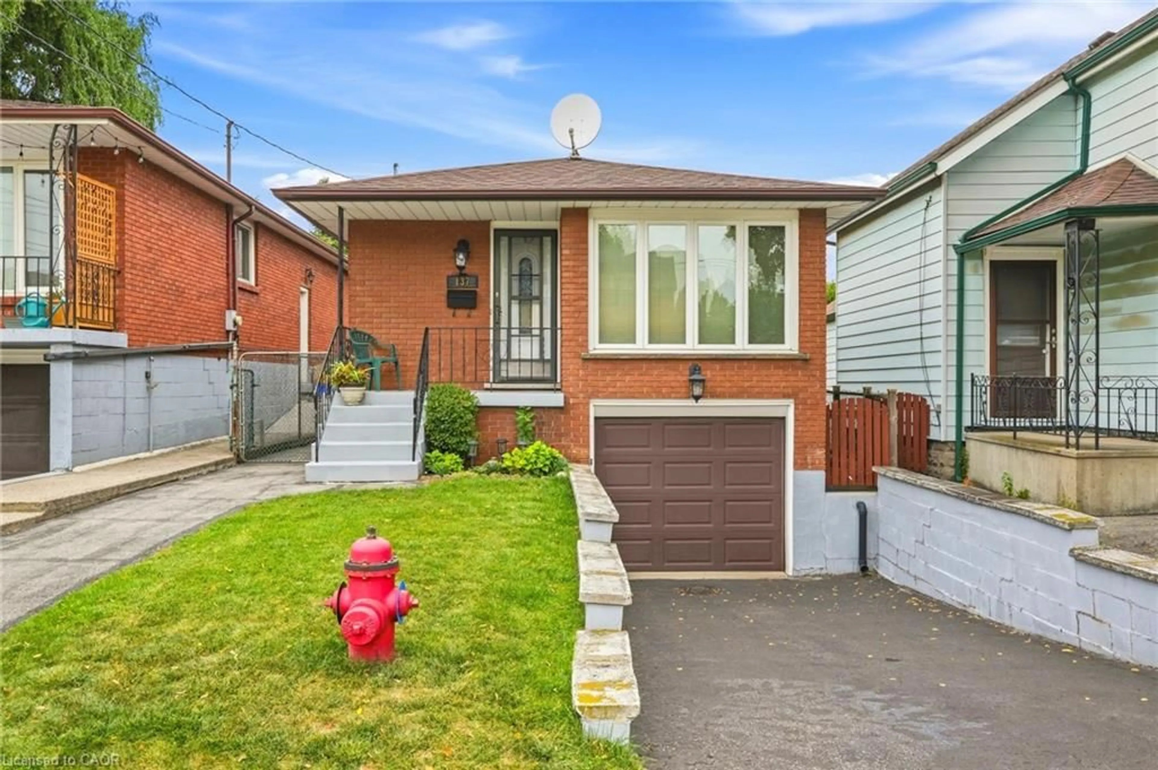 Home with brick exterior material, street for 137 Picton St, Hamilton Ontario L8L 3W7