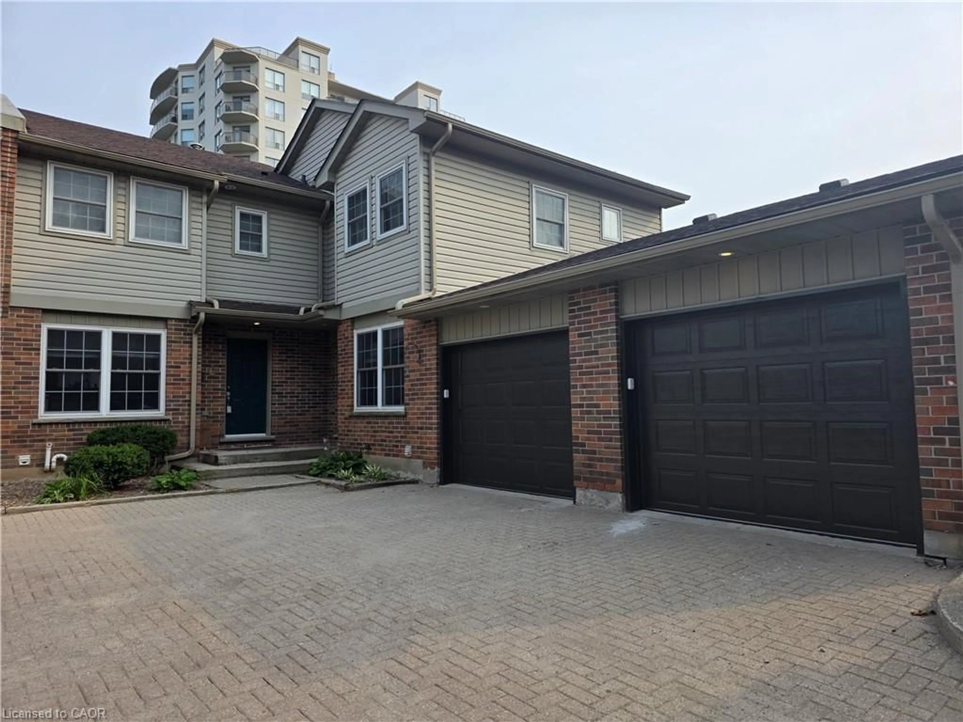 Home with brick exterior material, street for 250 Keats Way #6, Waterloo Ontario N2L 6J5