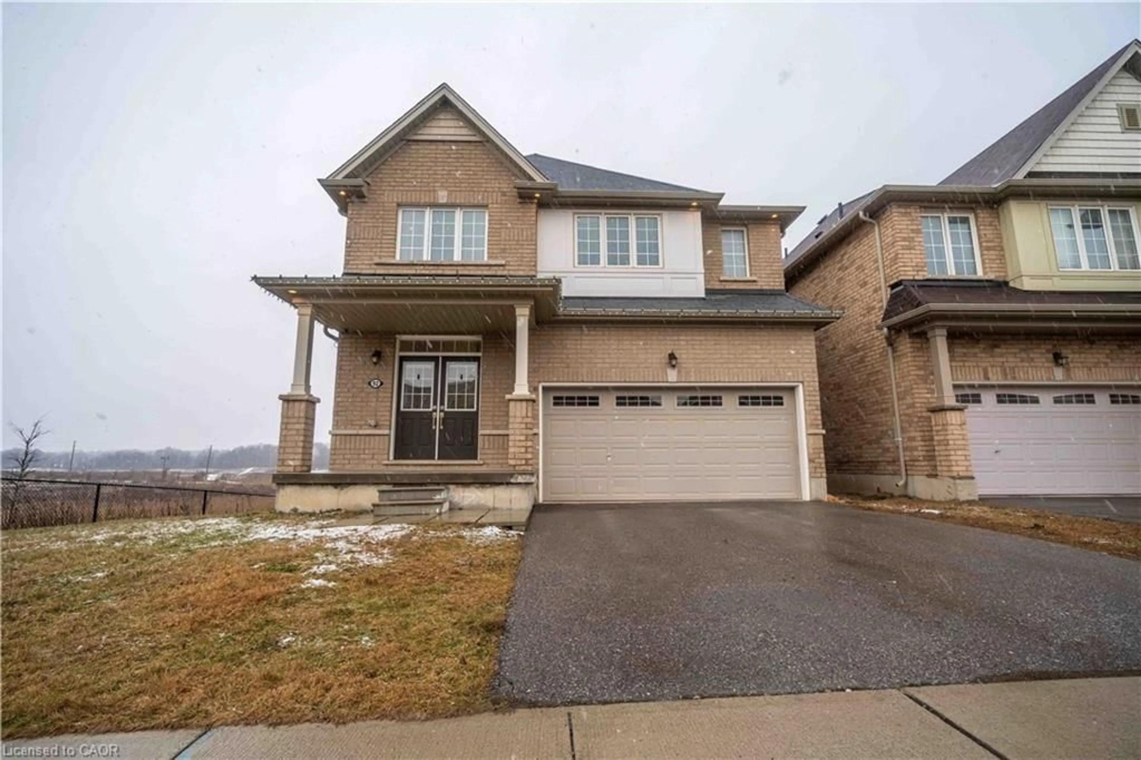 Home with brick exterior material, street for 92 Longboat Run, Brantford Ontario N3T 0P9