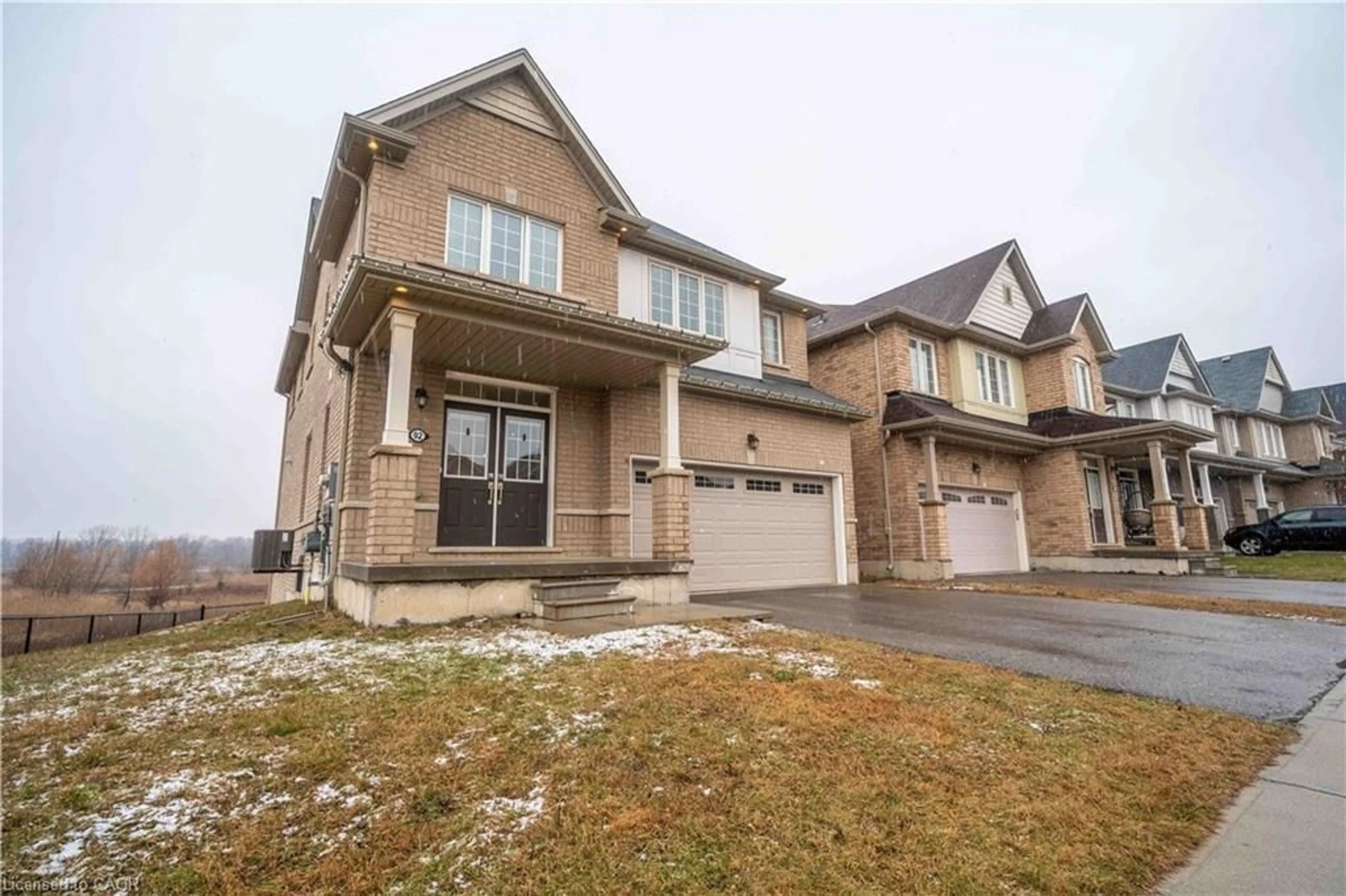 Home with brick exterior material, street for 92 Longboat Run, Brantford Ontario N3T 0P9