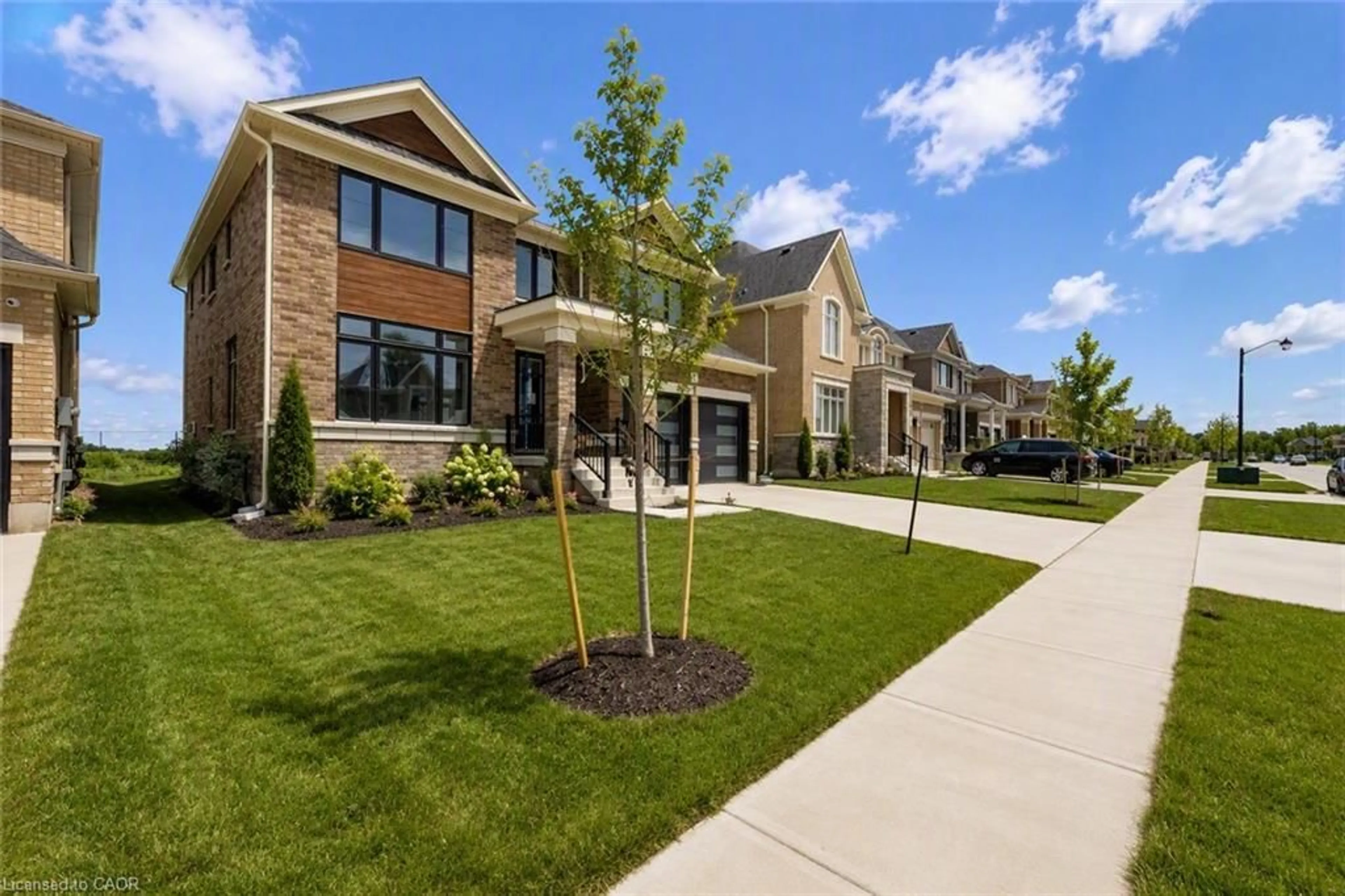 Home with brick exterior material, street for 51 Sparrow Way, Colgan Ontario L0G 1W0