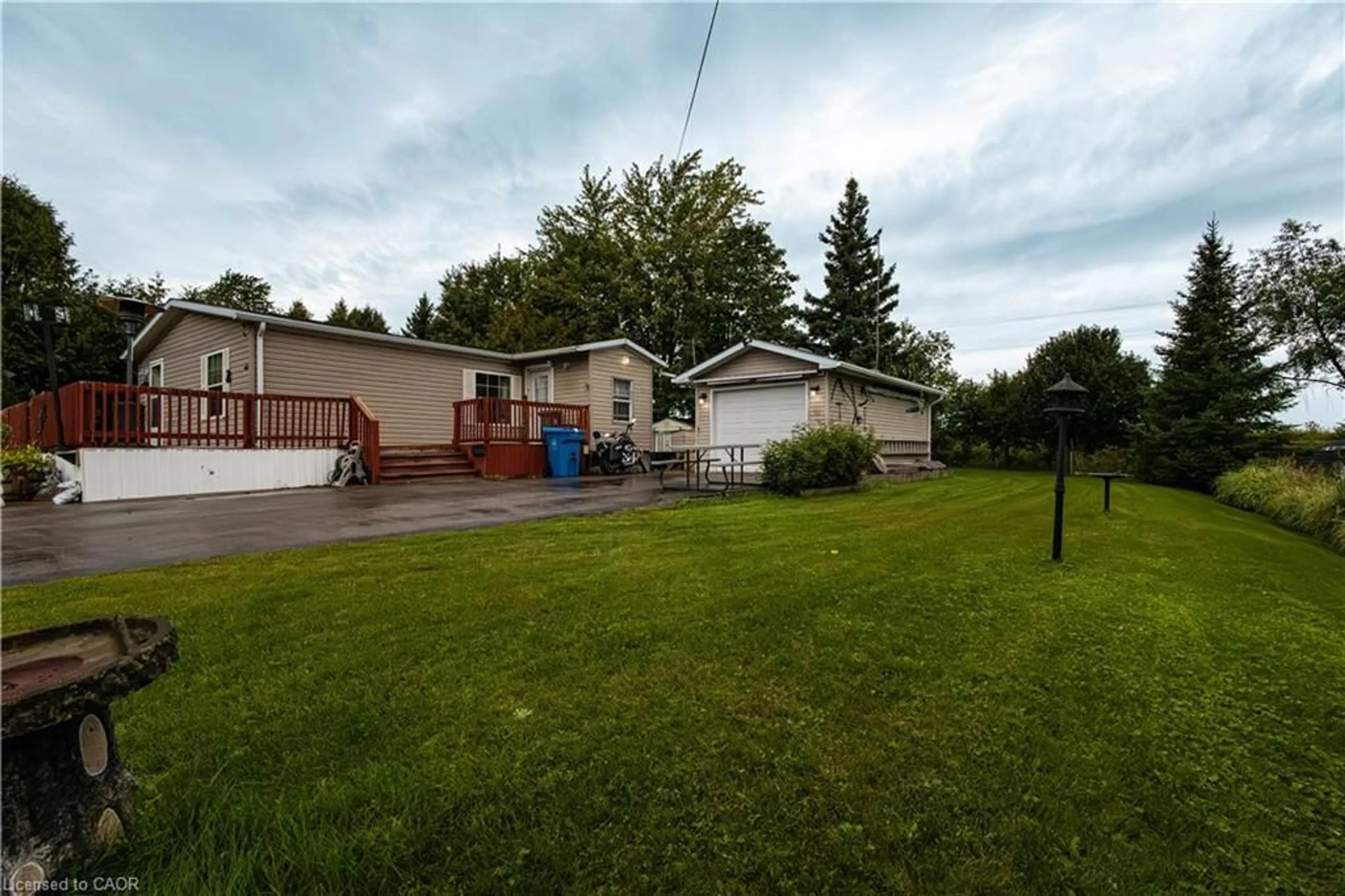 A pic from outside/outdoor area/front of a property/back of a property/a pic from drone, street for 19 Grand Vista Dr, Wellington North Ontario N0G 2L0