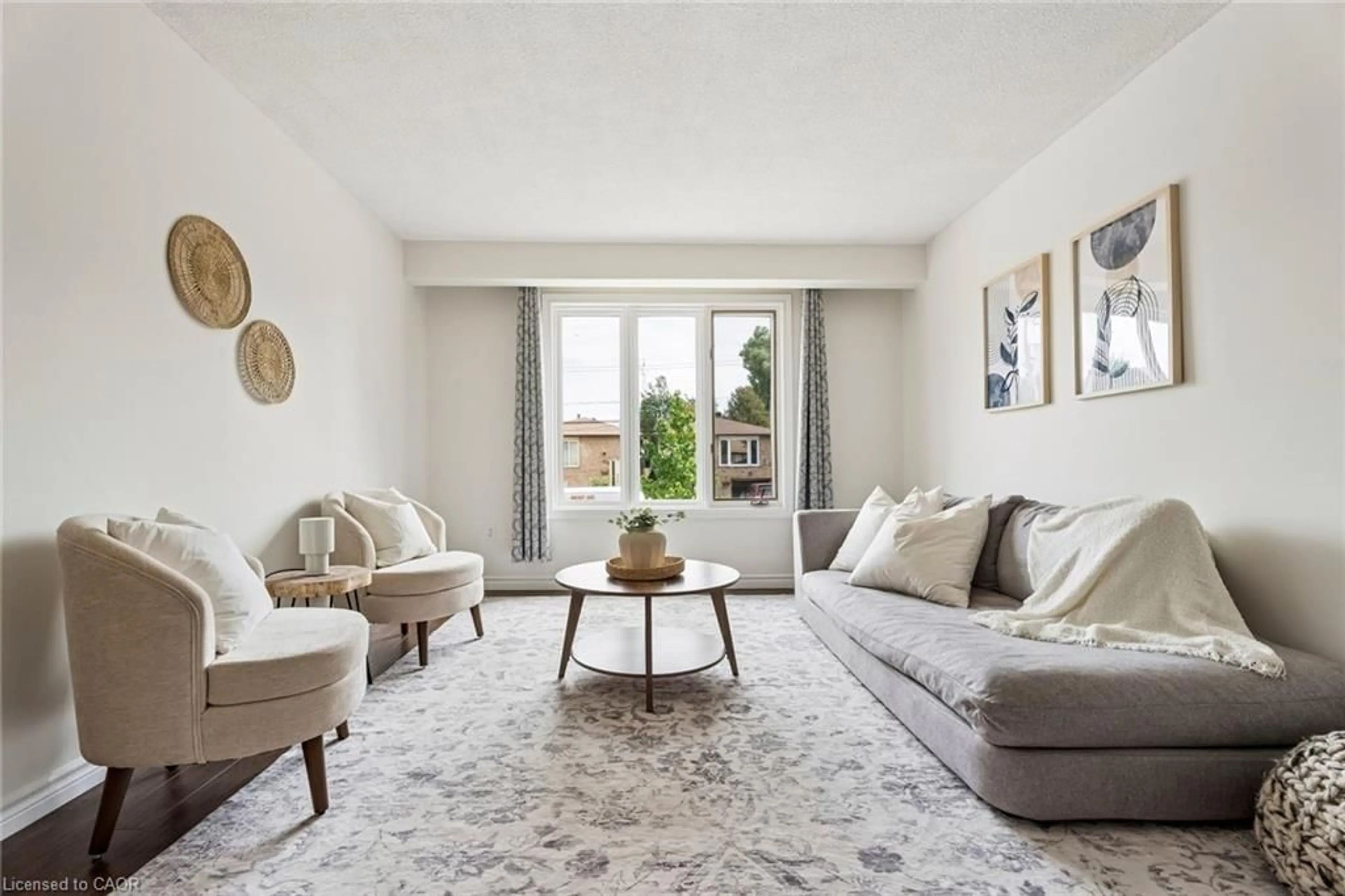 Living room with furniture, carpet floor for 317 Rexford Dr, Hamilton Ontario L8W 1W2