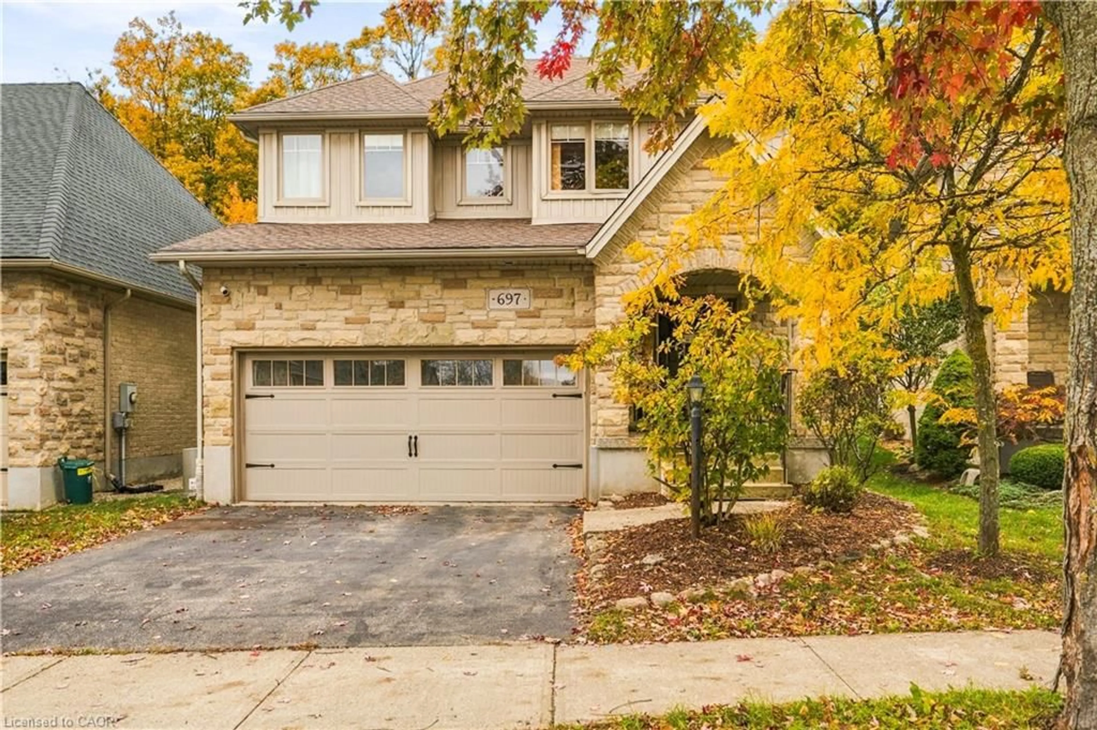 Home with brick exterior material, street for 697 Rhine Fall Dr, Waterloo Ontario N2V 2V5