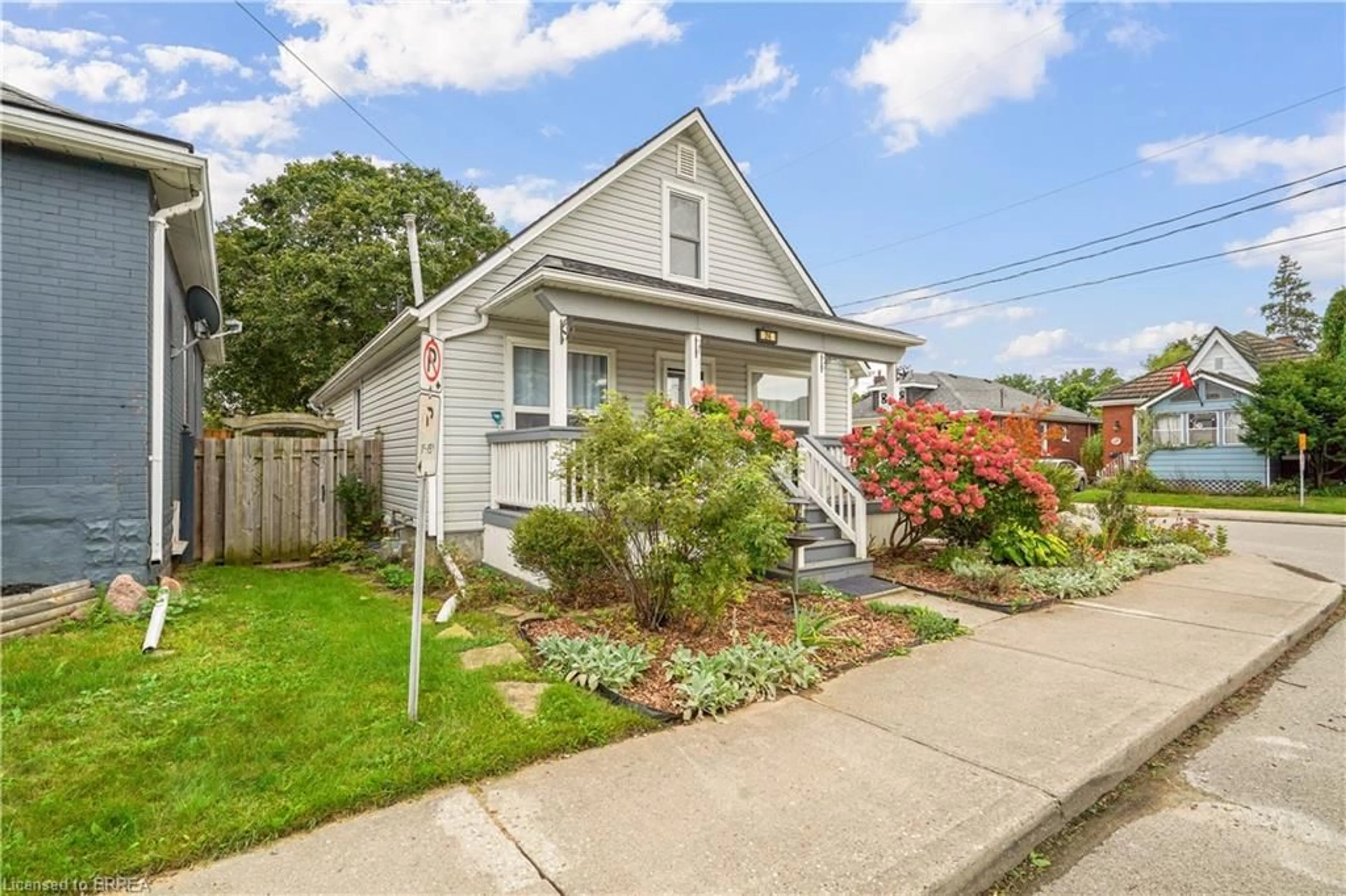 Home with vinyl exterior material, street for 24 Elliott Ave, Brantford Ontario N3T 1E5