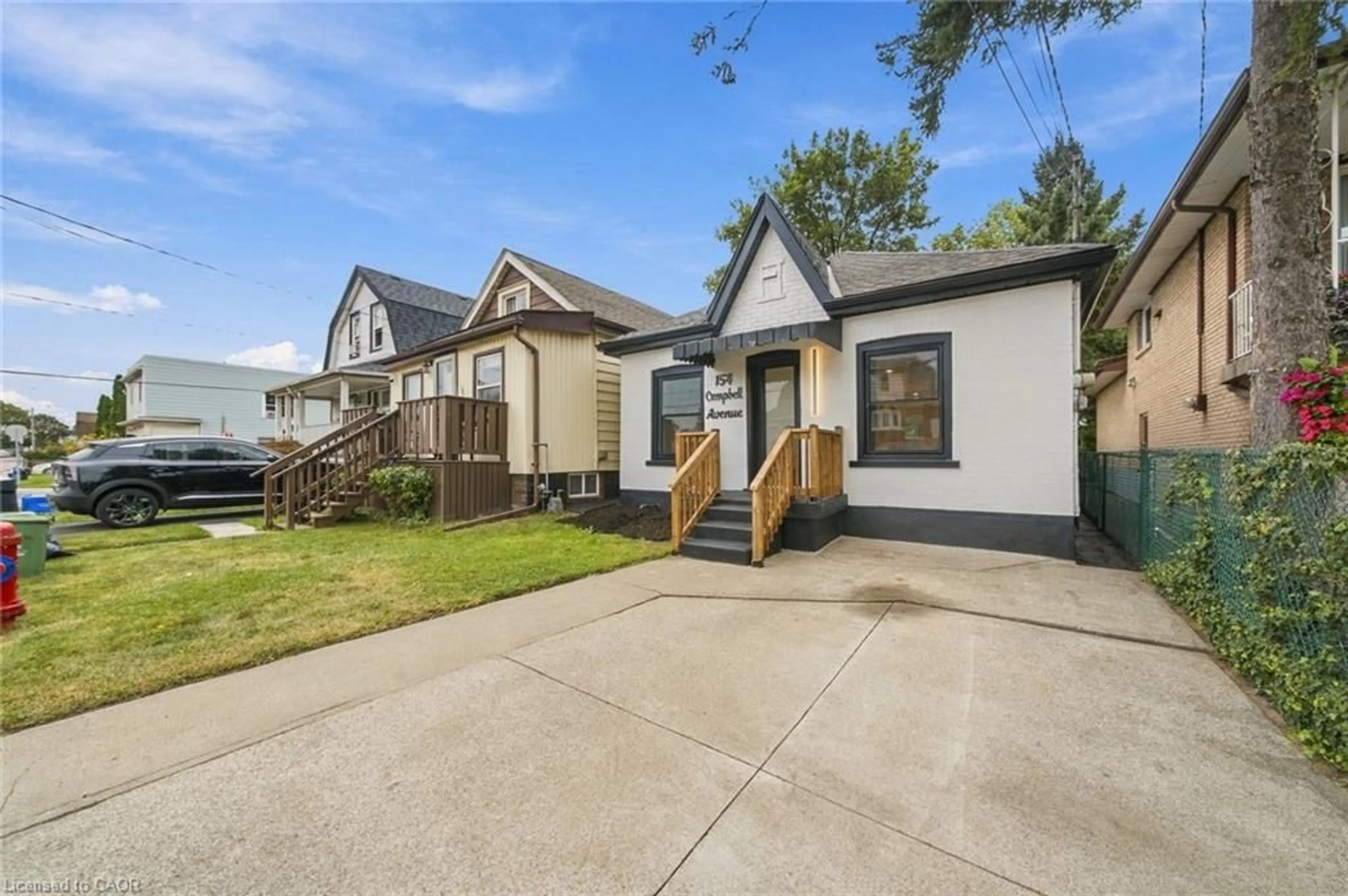 Home with vinyl exterior material, street for 154 Campbell Ave, Hamilton Ontario L8H 2E9