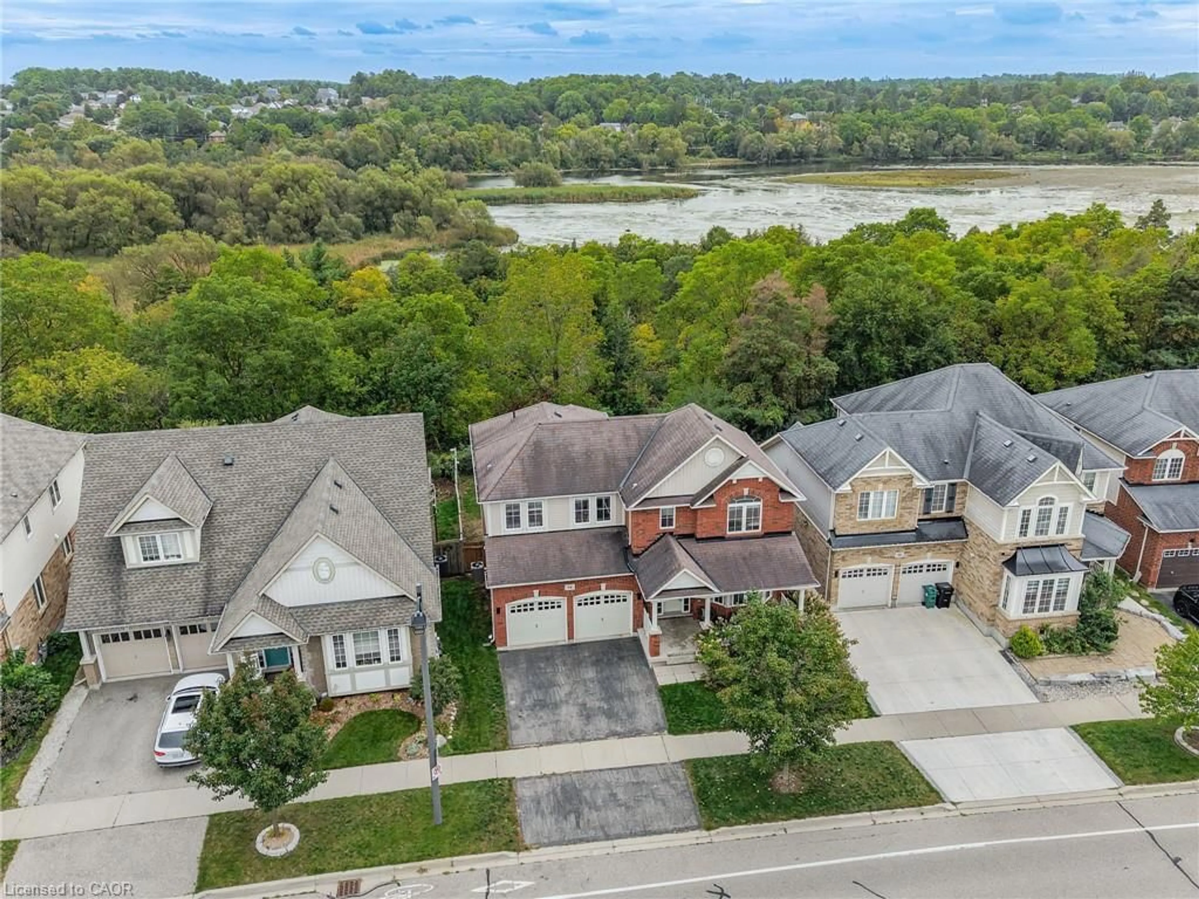 A pic from outside/outdoor area/front of a property/back of a property/a pic from drone, water/lake/river/ocean view for 94 Baldwin Dr, Cambridge Ontario N3C 0B4