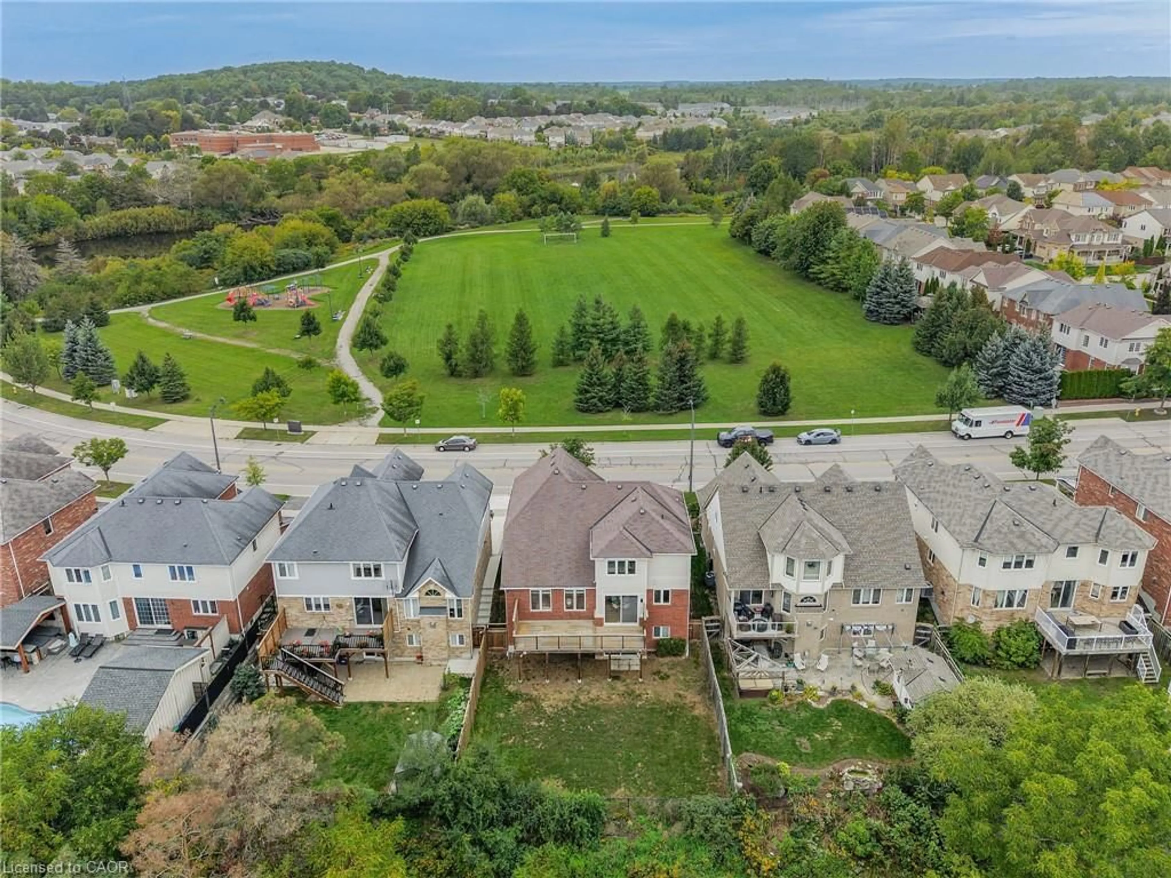 A pic from outside/outdoor area/front of a property/back of a property/a pic from drone, unknown for 94 Baldwin Dr, Cambridge Ontario N3C 0B4