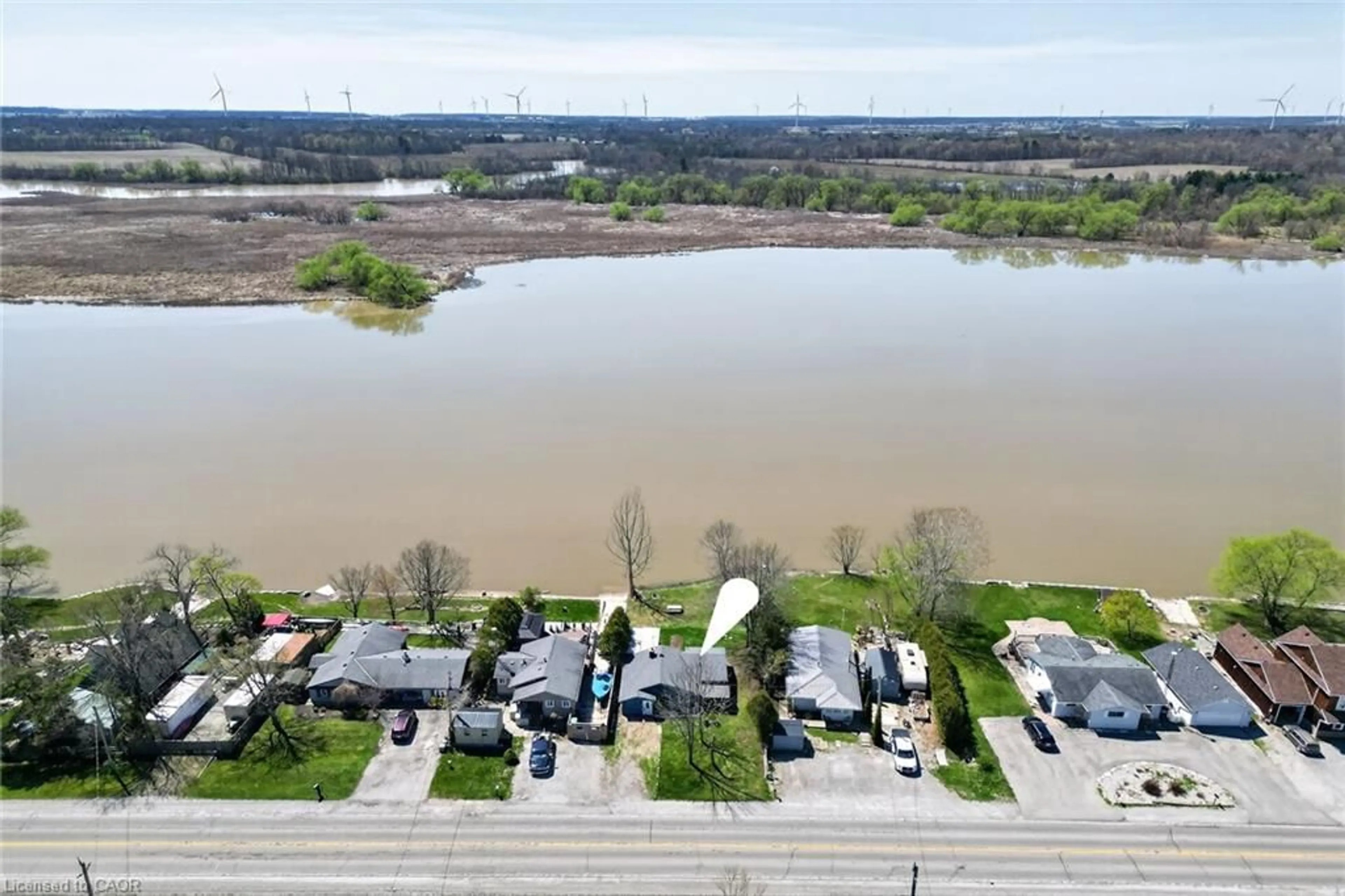 A pic from outside/outdoor area/front of a property/back of a property/a pic from drone, water/lake/river/ocean view for 111 Haldimand Rd 17, Dunnville Ontario N0A 1E0