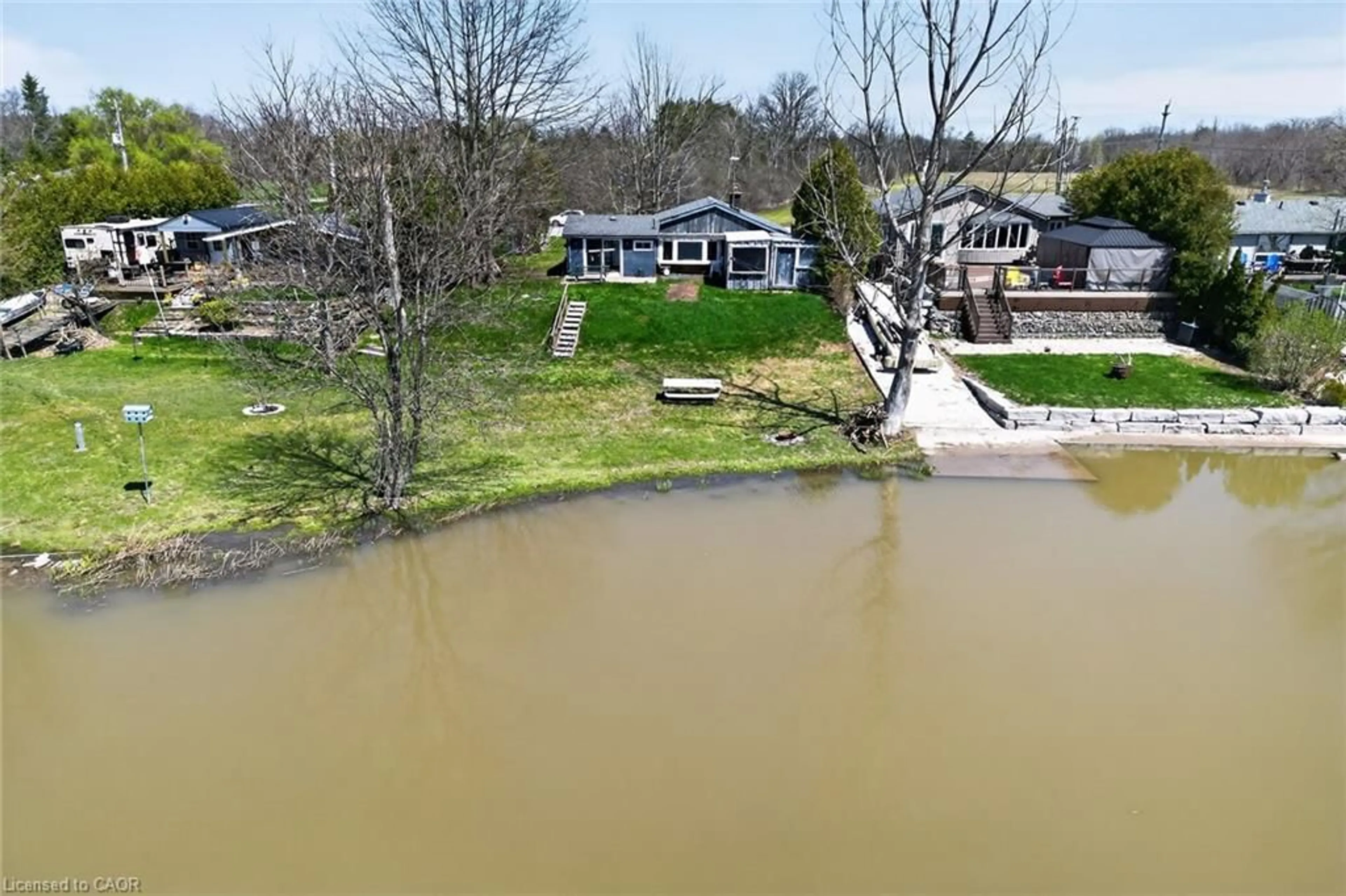A pic from outside/outdoor area/front of a property/back of a property/a pic from drone, water/lake/river/ocean view for 111 Haldimand Rd 17, Dunnville Ontario N0A 1E0