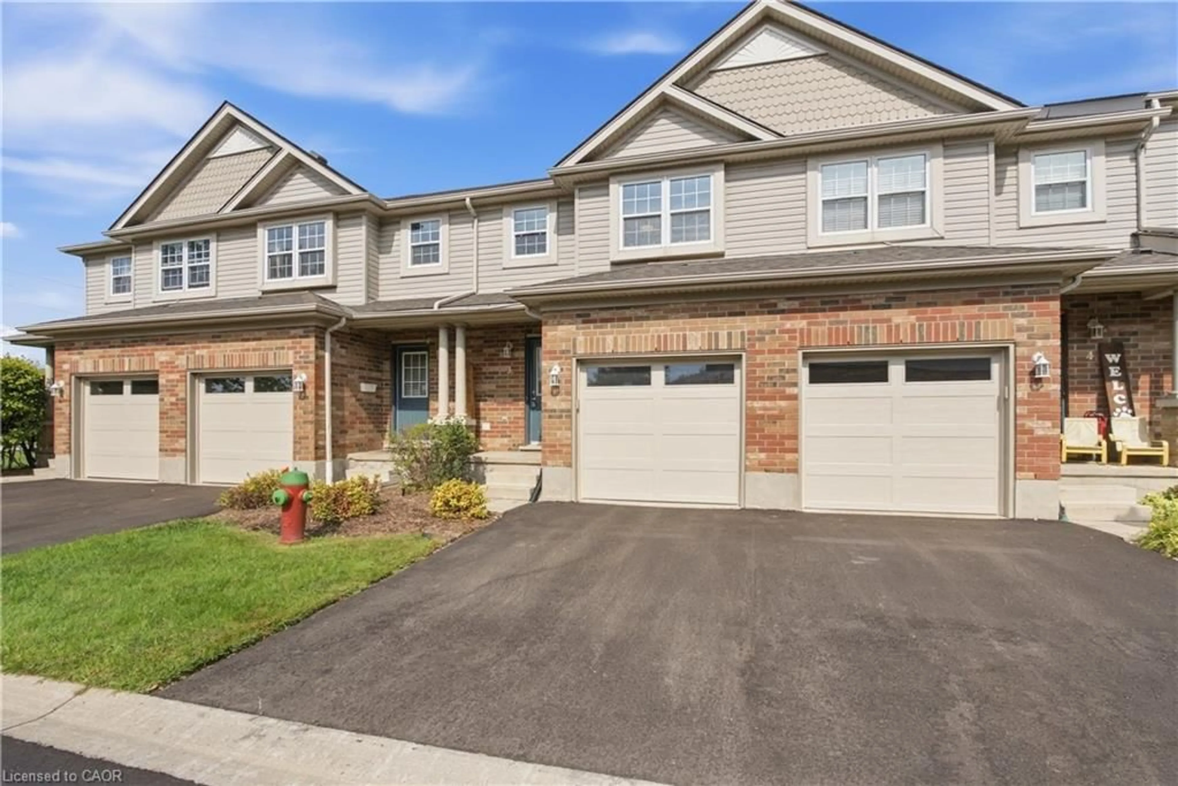 Home with brick exterior material, street for 30 Imperial Rd #3, Guelph Ontario N1K 1Y5