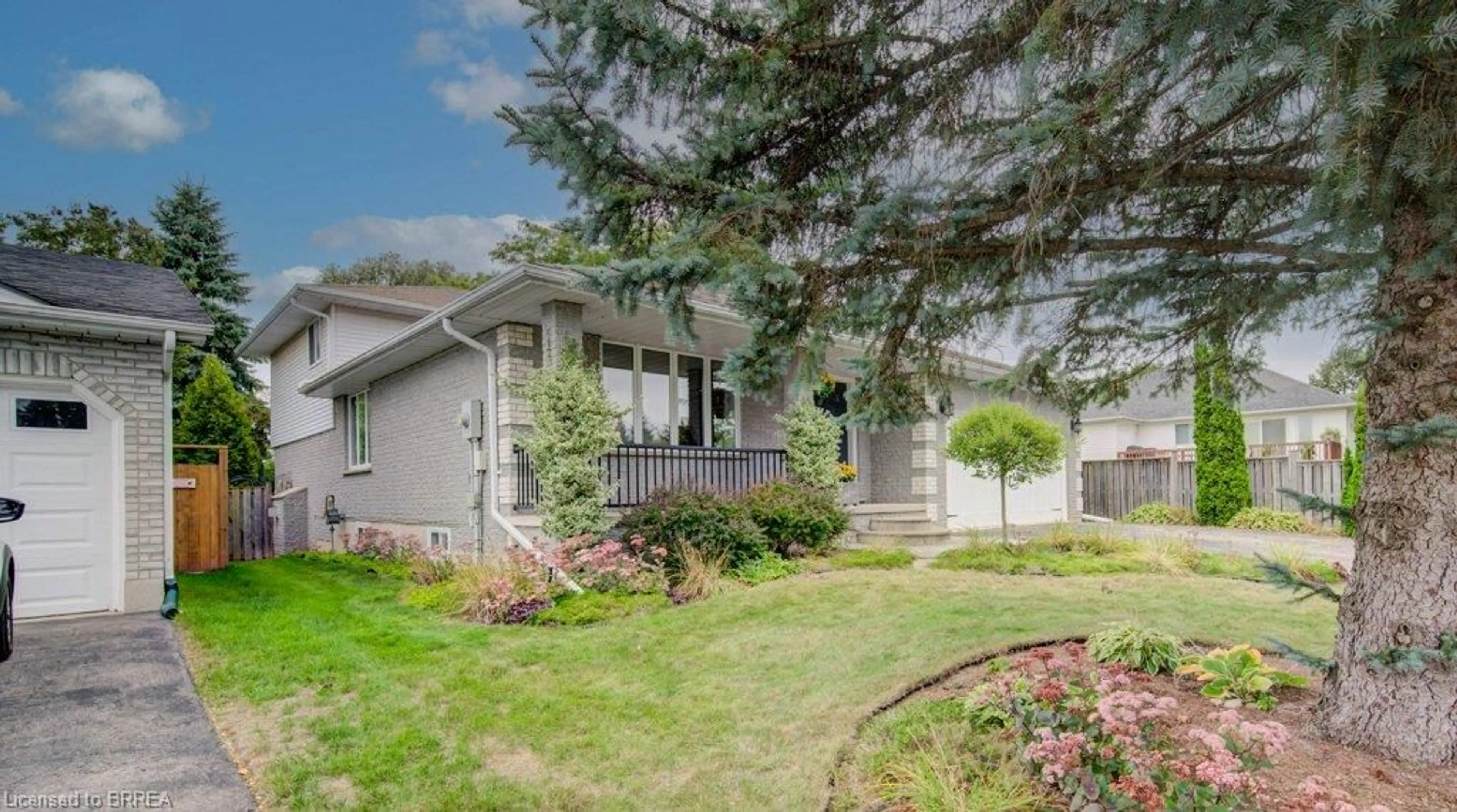 Home with vinyl exterior material, street for 27 Olivetree Rd, Brantford Ontario N3R 5E9