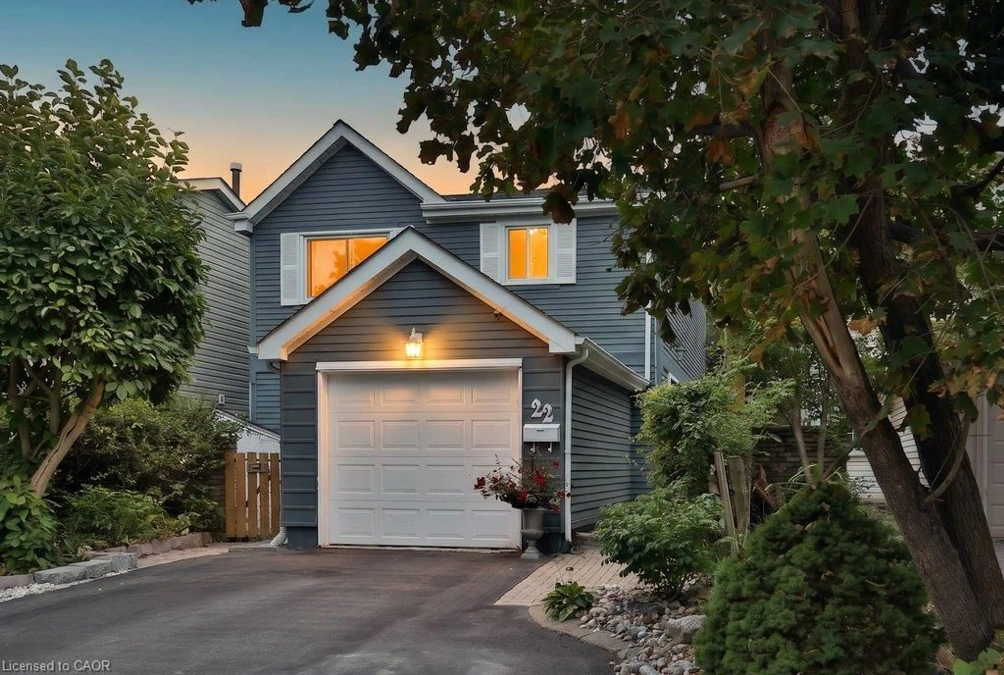 Home with vinyl exterior material, street for 22 Monterey Ave, Brampton Ontario L6Z 1B5