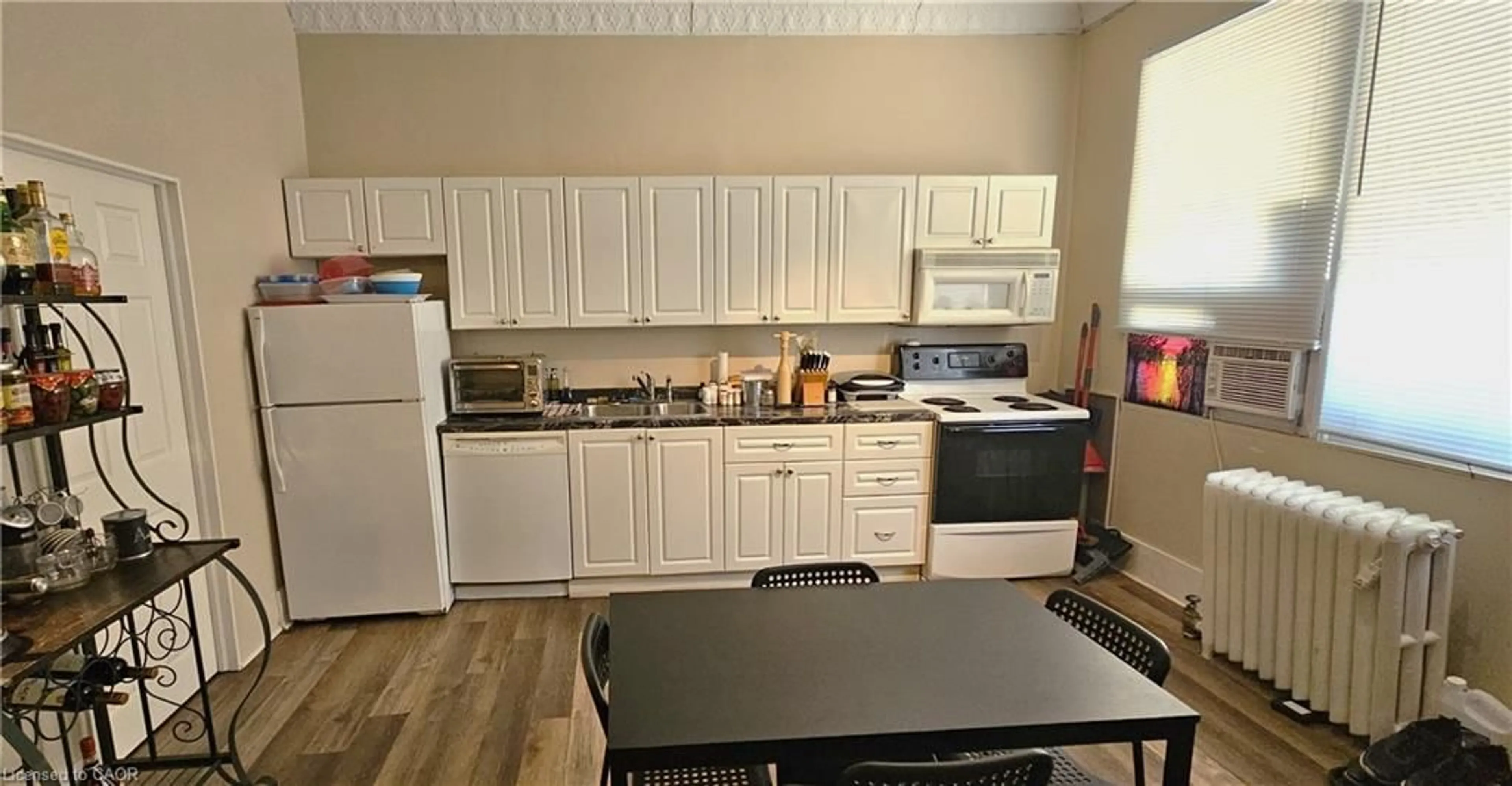 Standard kitchen, wood/laminate floor for 74 Locke St, Hamilton Ontario L8R 3A5