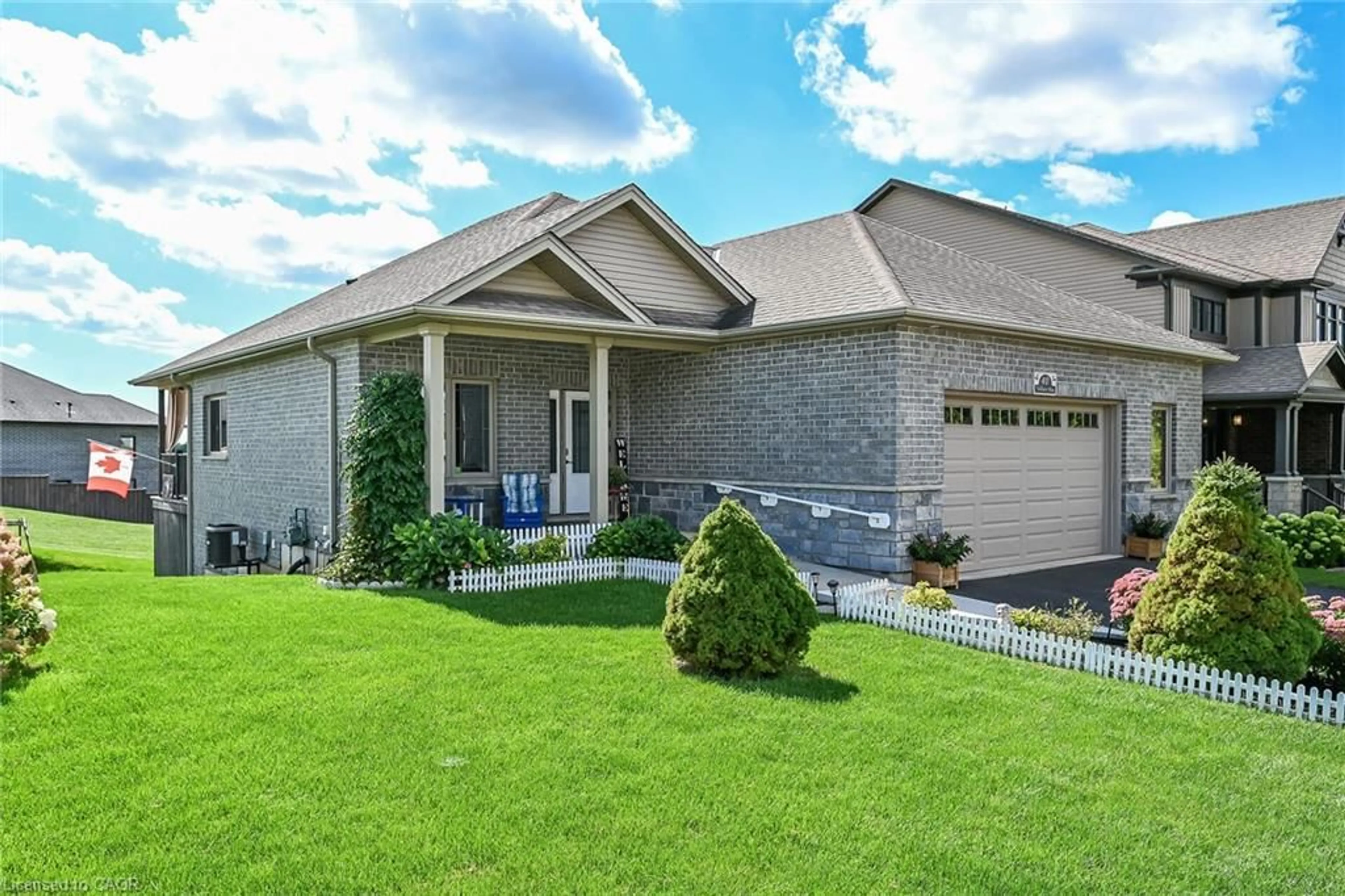 Home with brick exterior material, street for 40 Trillium Way, Simcoe Ontario N3Y 0B9