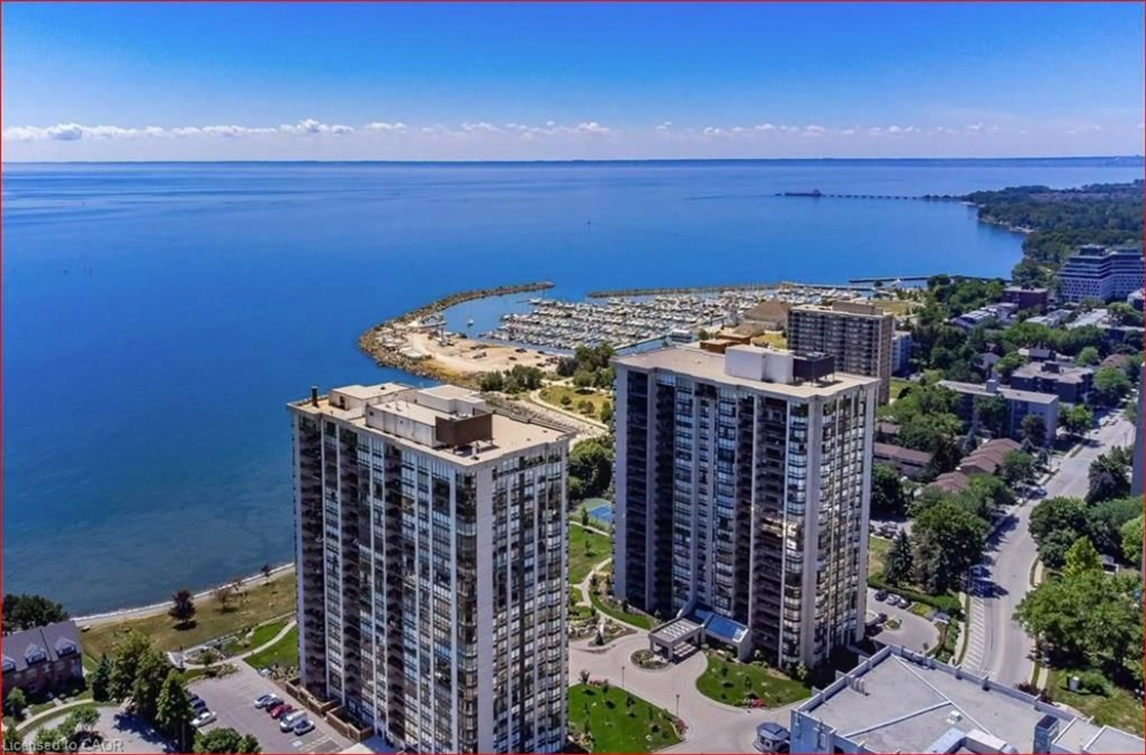 A pic from outside/outdoor area/front of a property/back of a property/a pic from drone, water/lake/river/ocean view for 2170 Marine Dr #1103, Oakville Ontario L6L 5V1