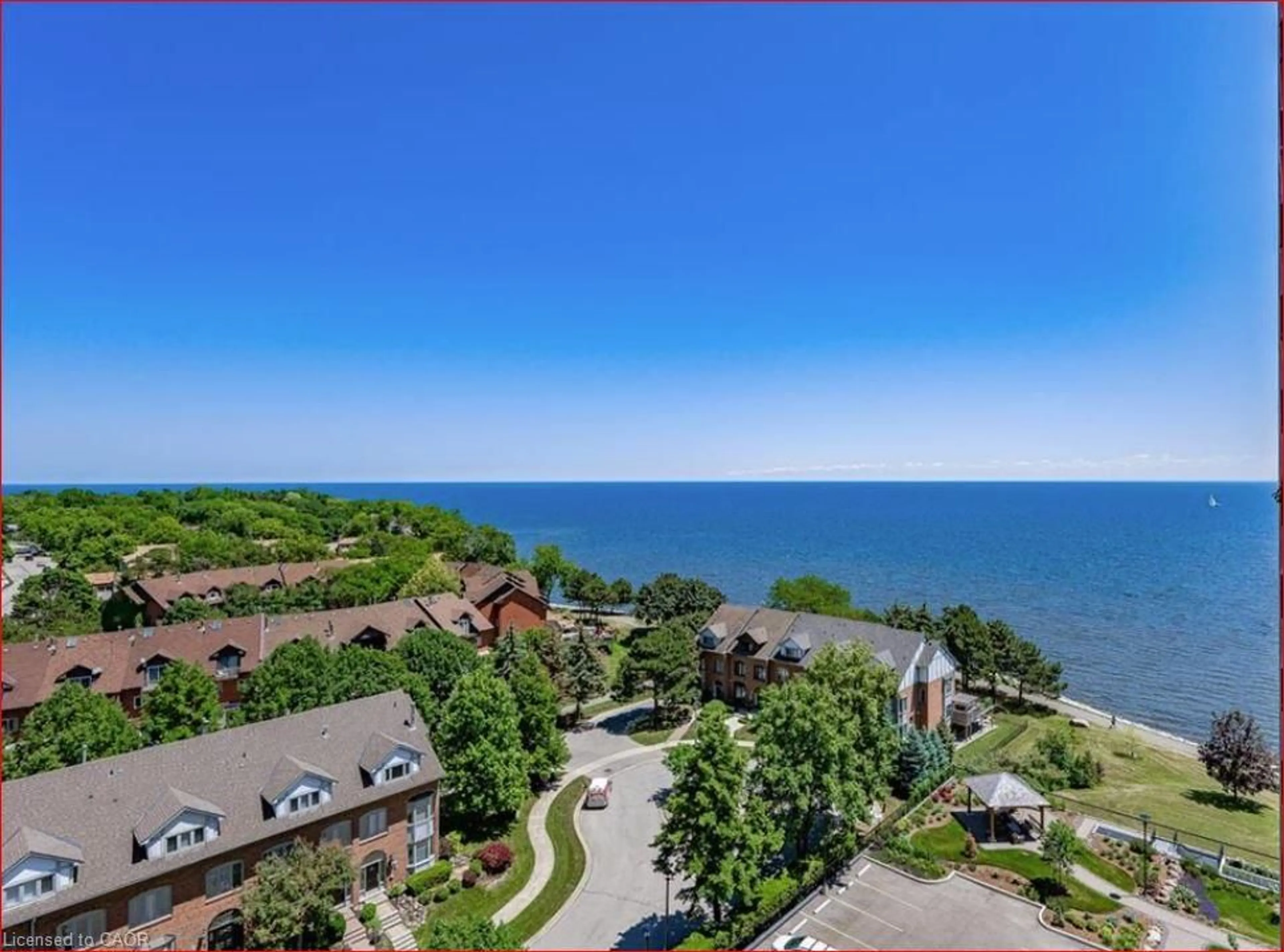 A pic from outside/outdoor area/front of a property/back of a property/a pic from drone, water/lake/river/ocean view for 2170 Marine Dr #1103, Oakville Ontario L6L 5V1
