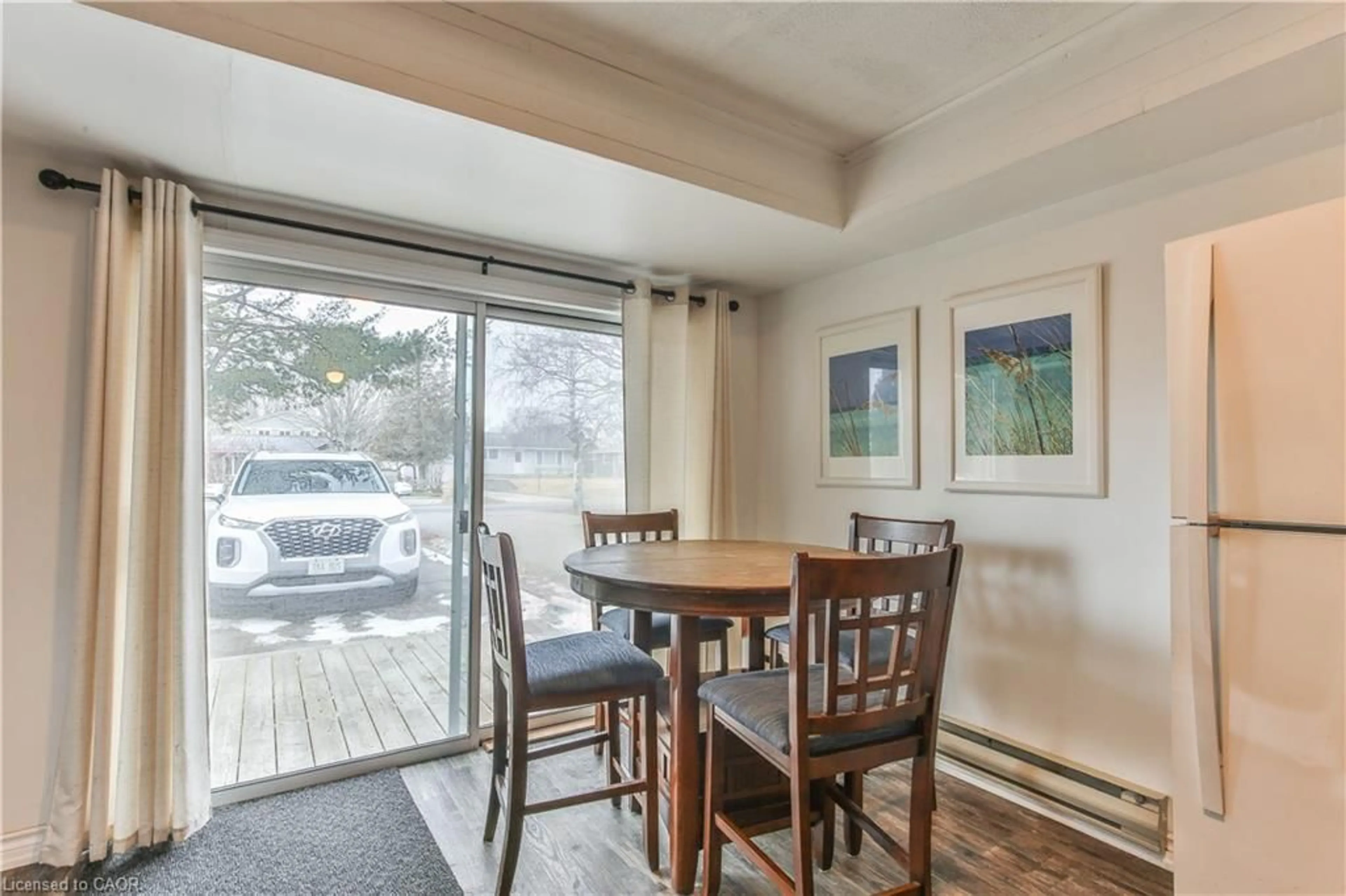 Dining room, wood/laminate floor for 7 Willow Ave, Long Point Ontario N0E 1M0