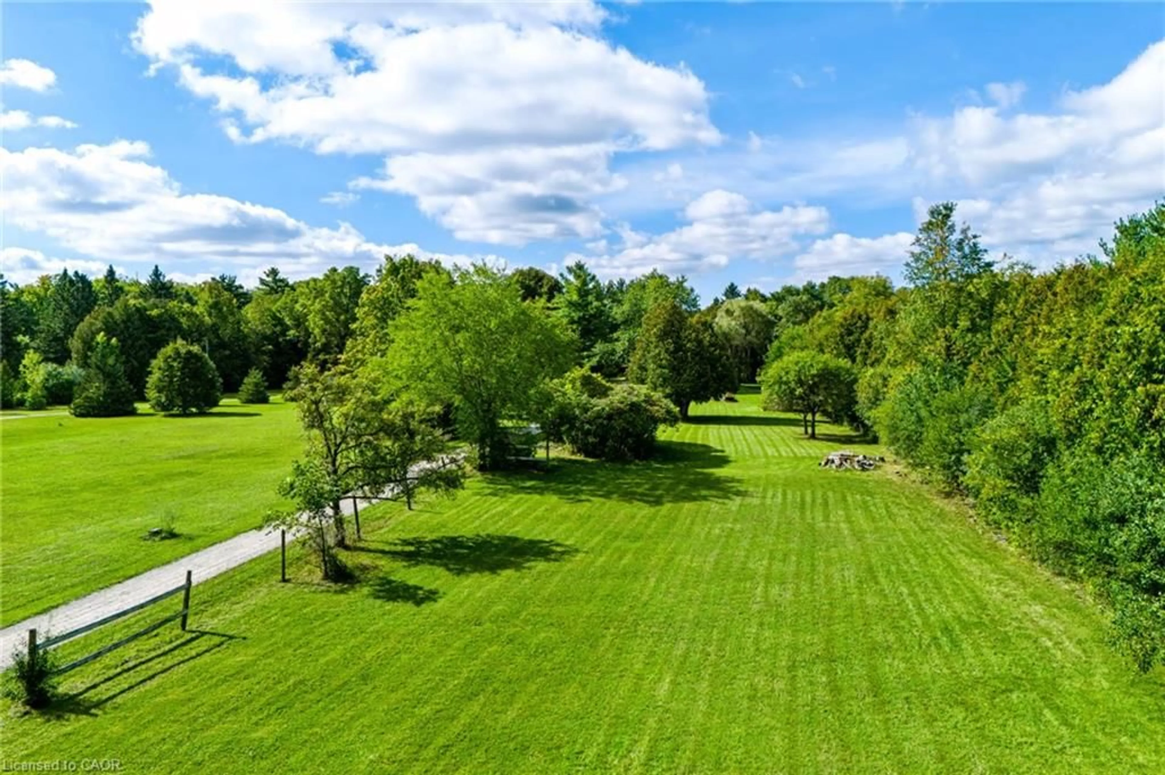 A pic from outside/outdoor area/front of a property/back of a property/a pic from drone, forest/trees view for 7448 Mcniven Rd, Campbellville Ontario L0P 1B0