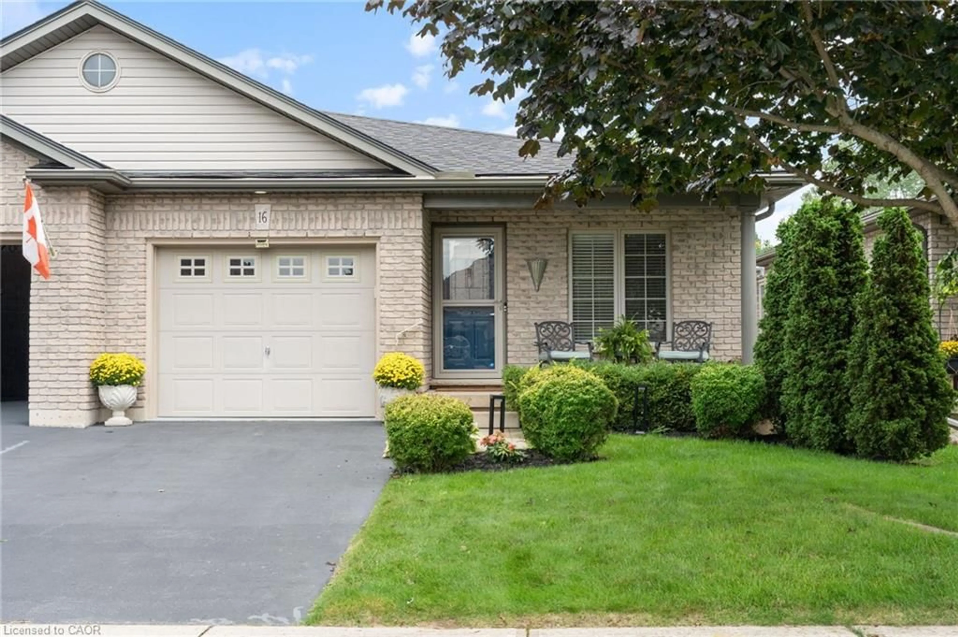 Home with brick exterior material, street for 16 Pheasant Trail, Port Dover Ontario N0A 1N5