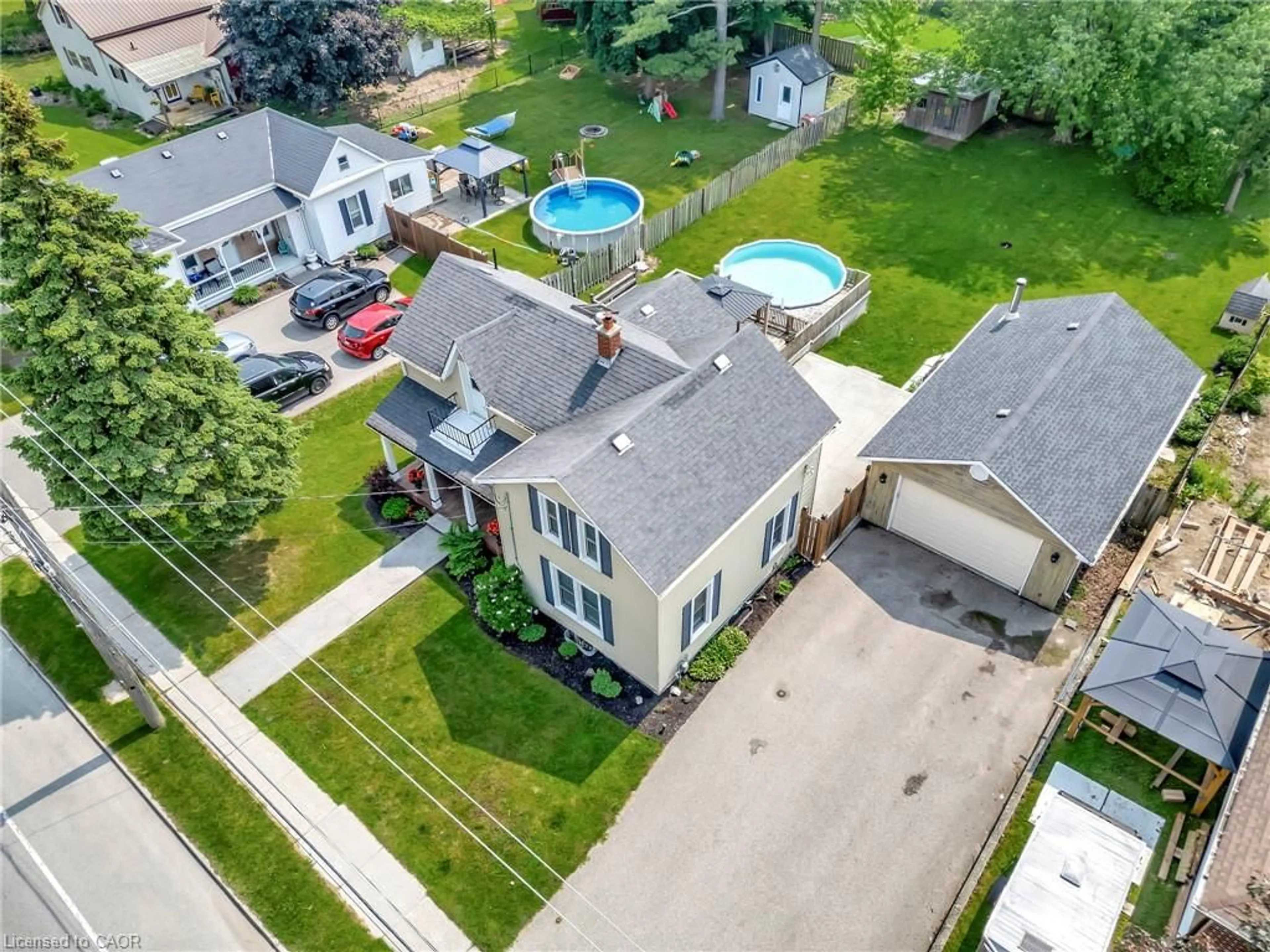A pic from outside/outdoor area/front of a property/back of a property/a pic from drone, street for 123 Blandford St, Innerkip Ontario N0J 1M0