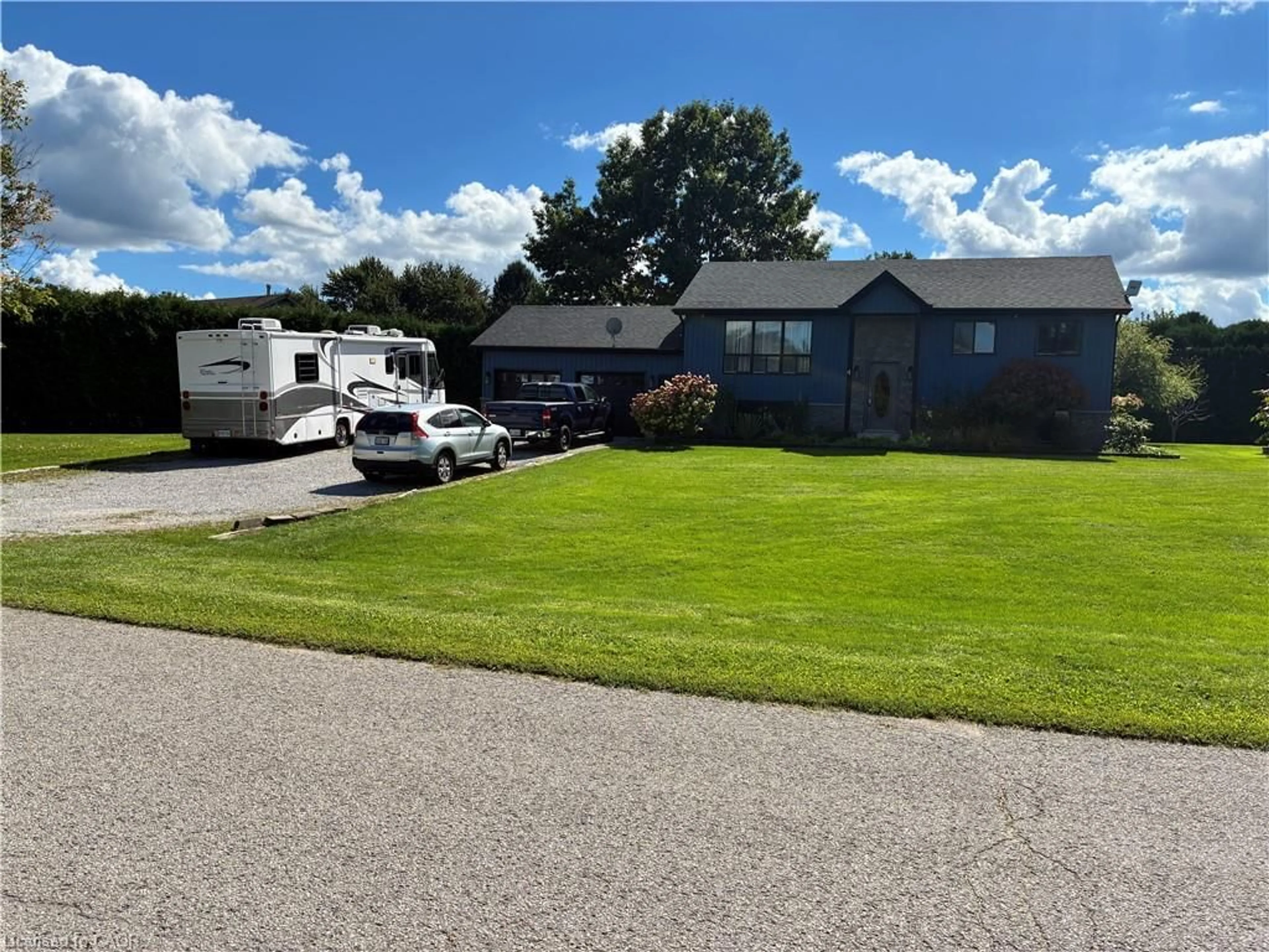 A pic from outside/outdoor area/front of a property/back of a property/a pic from drone, unknown for 4 Rosemarie Blvd, Delhi Ontario N4B 2W4