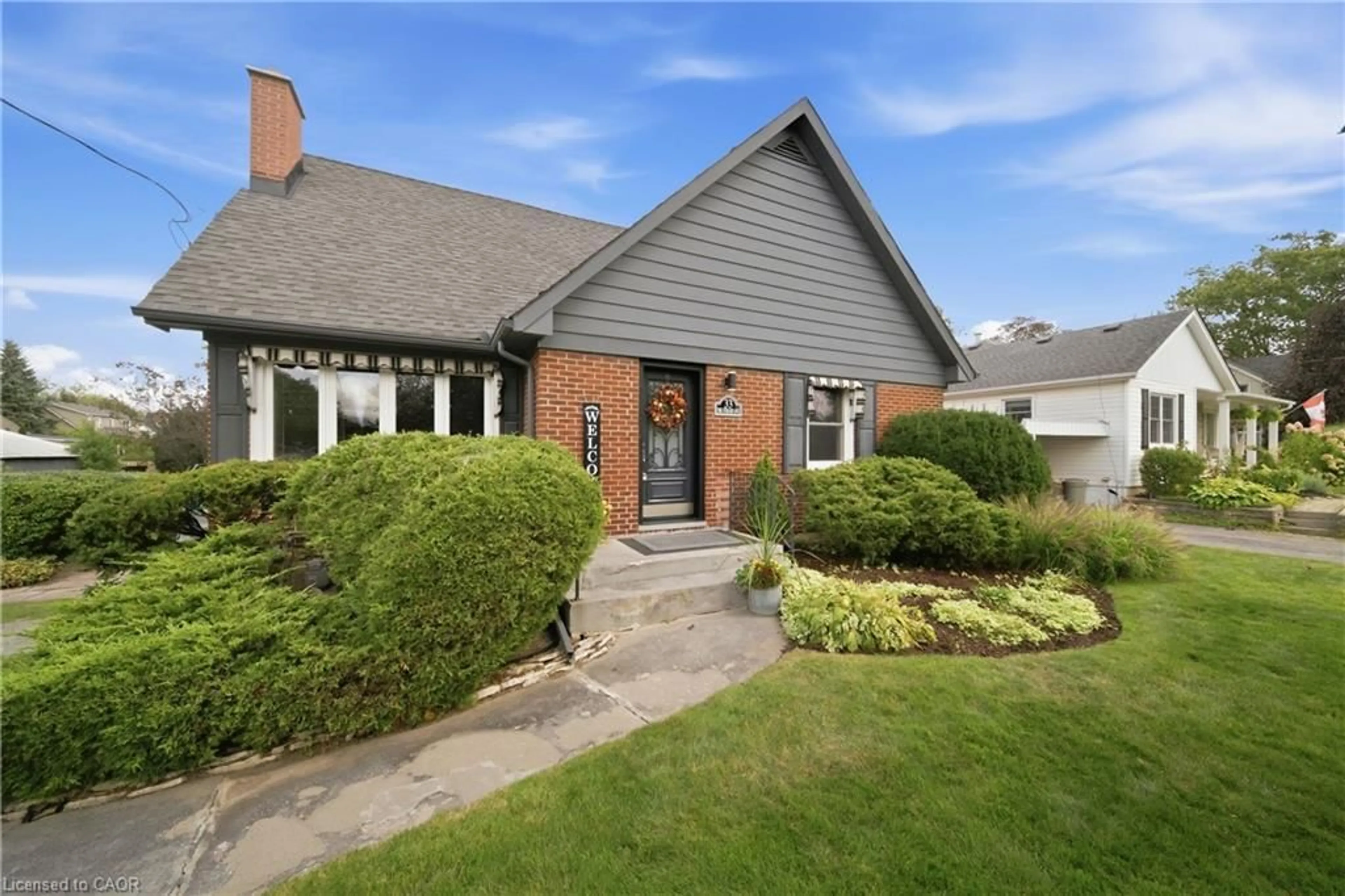 Home with brick exterior material, street for 33 The Strand Ave, Brantford Ontario N3R 1Z2